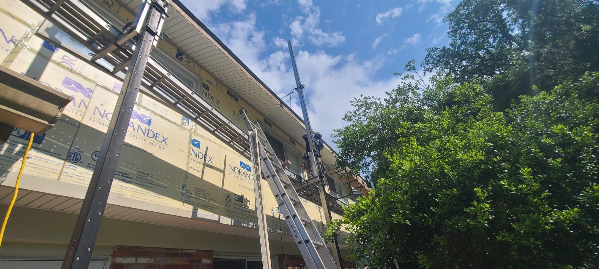 Fairfax: Residential Siding Replacement with CertainTeed 8" Board and Batten Siding in Desert Tan by RM Banning, Inc.