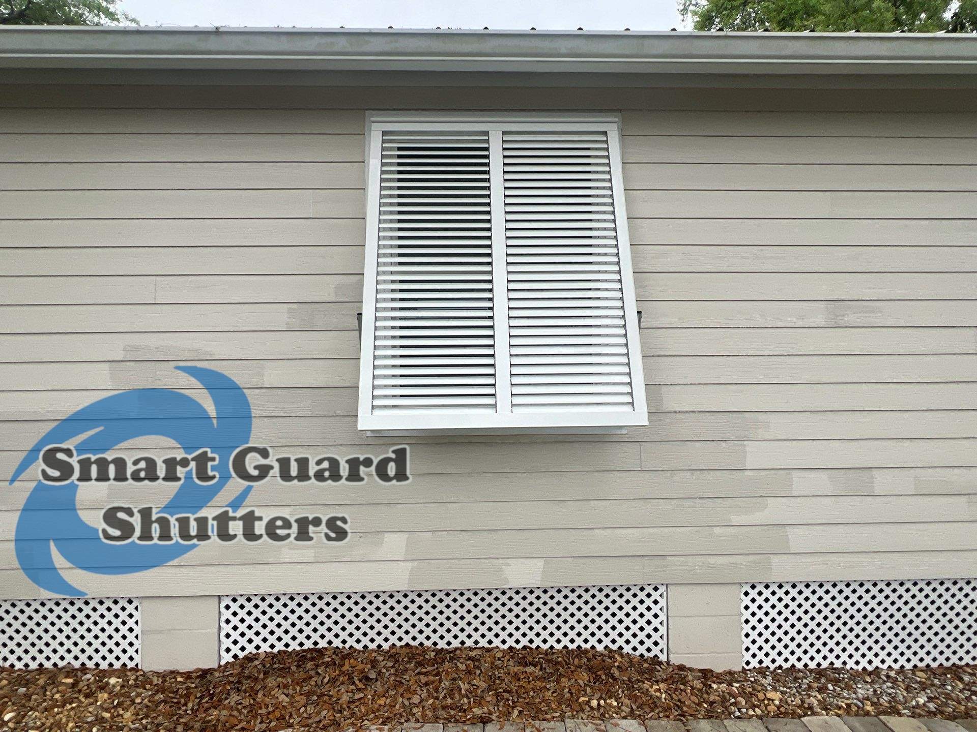Hurricane rated Bahama Shutters in Traffic White  by Smart Guard Shutters