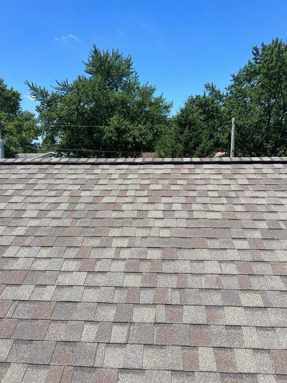 Residential Roofing Repair using Ridge vent replacement by Nitro Roofing and Construction