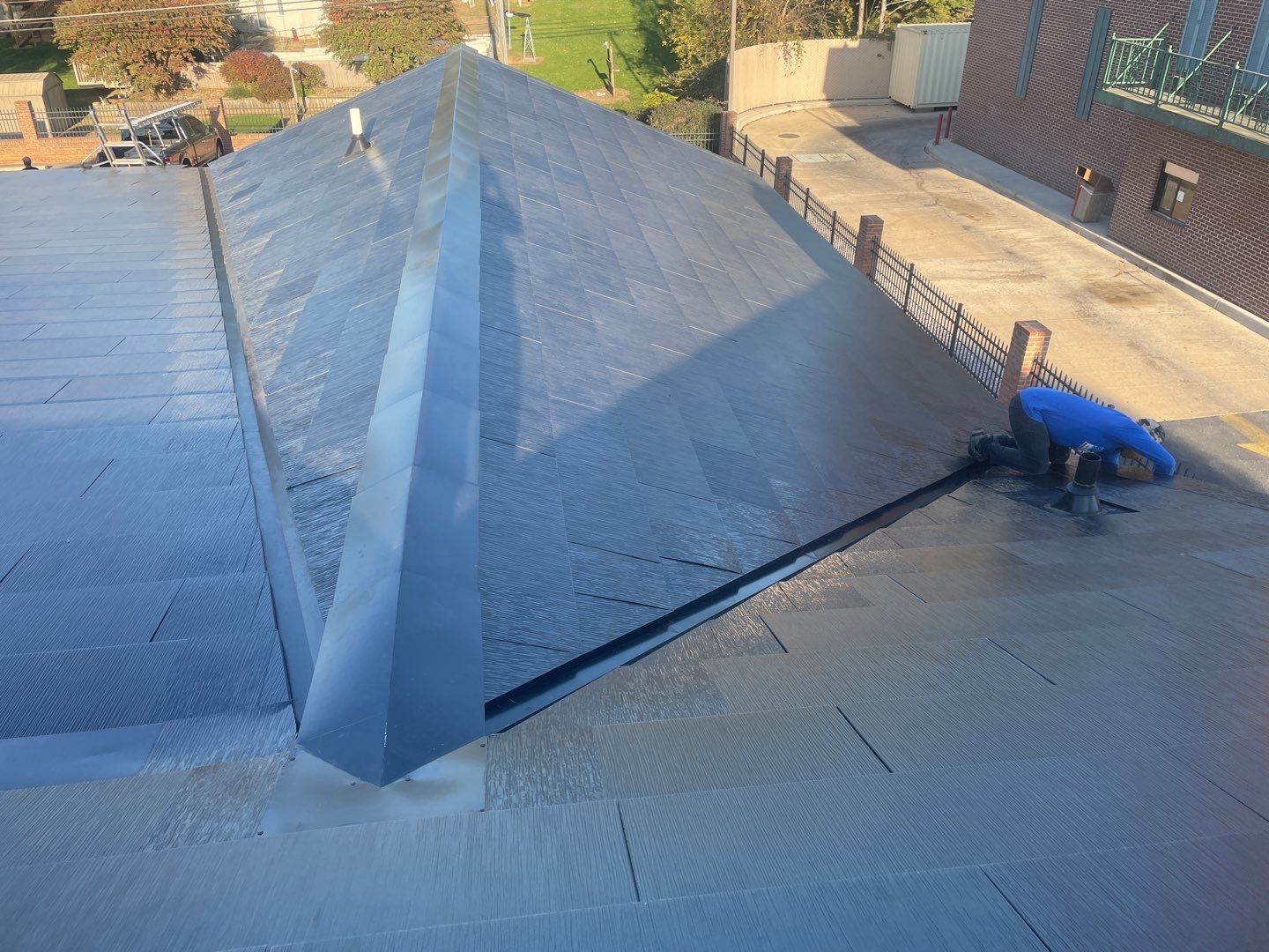 Tesla Solar Roof on a Commercial Building by American Home Contractors