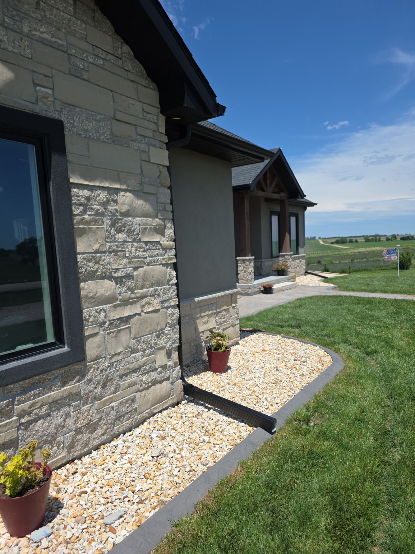 Pella Window and Seamless Gutter Installation in Ravenna by Loyal Nine