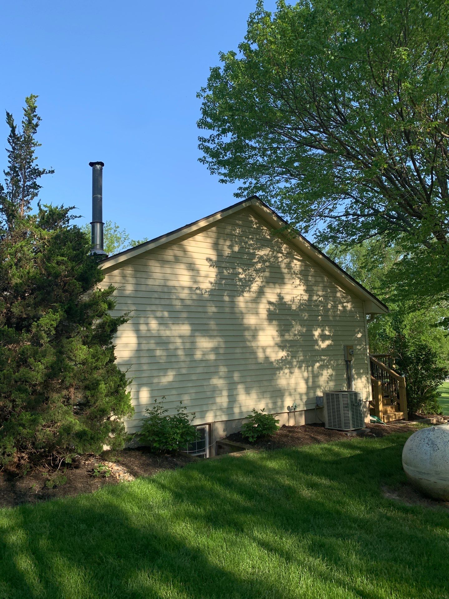 New Craneboard Siding on this Platte City, Mo home  by EEC  Windows, Siding & Roofing 