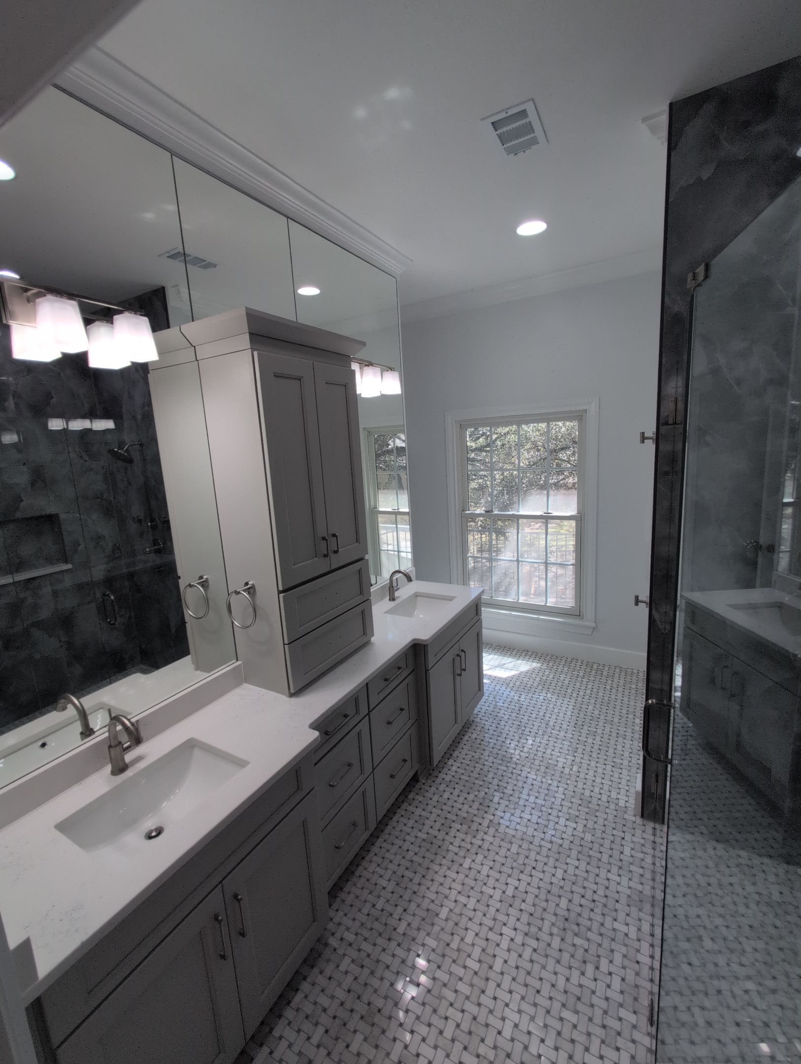 Walker Ranch Bathroom Remodel with Expanded Walk-In Shower and Custom Storage by Legacy Bath and Kitchen
