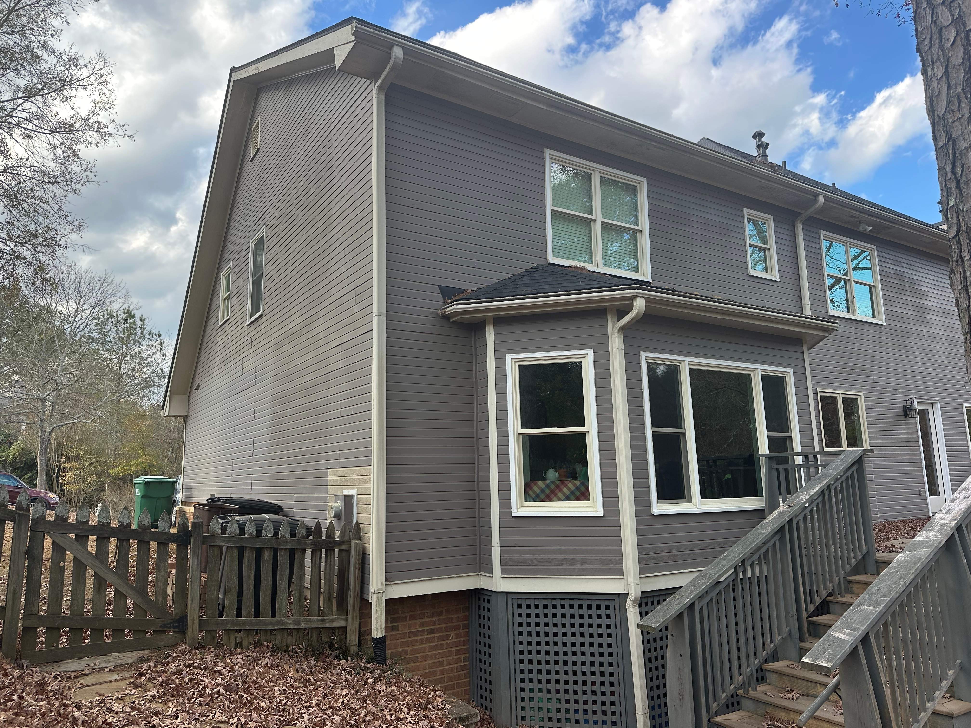 James Hardie Siding Replacement, Exterior Painting, Deck Stain, and Gutter Installation in Peachtree Corners, GA by Nelson Exteriors