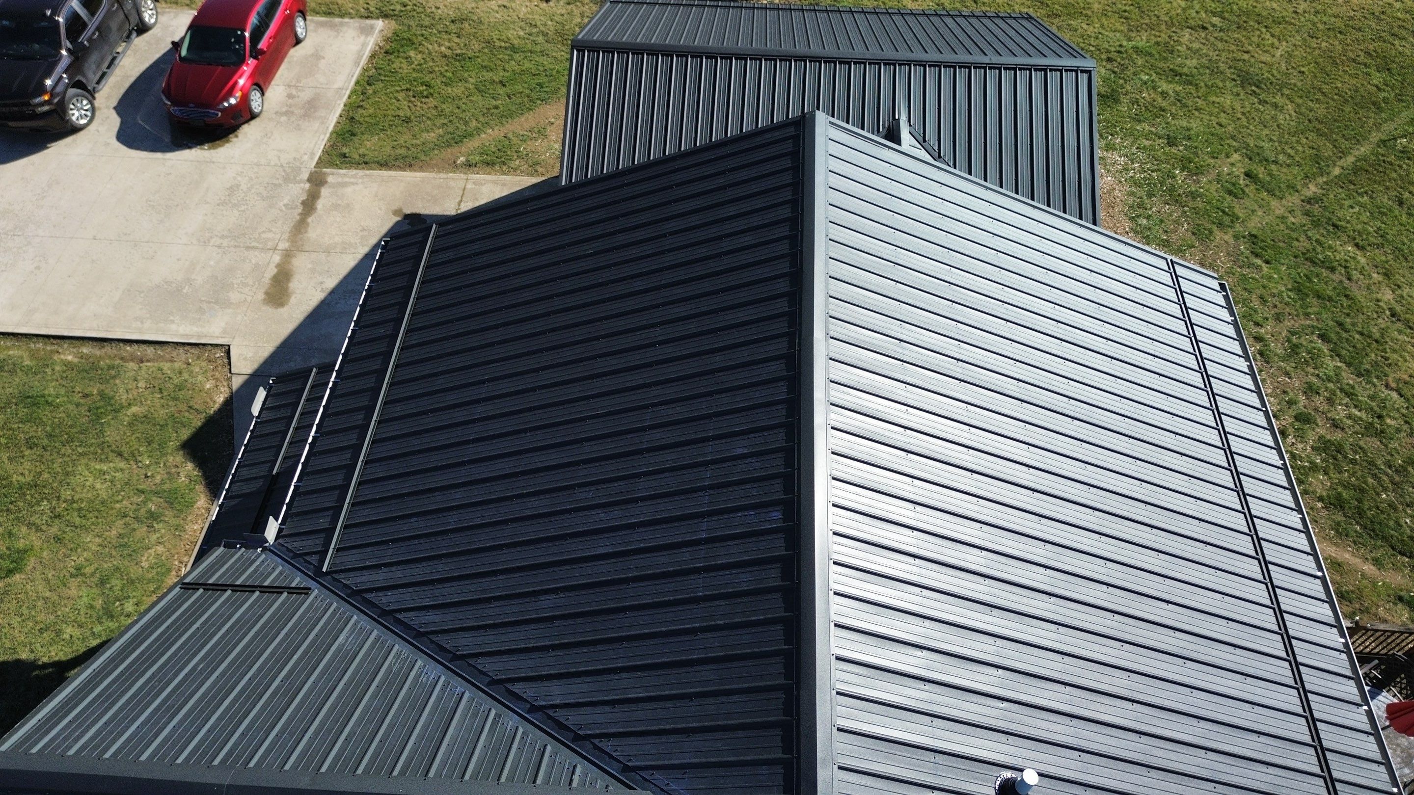 Residential Roofing Installation using Performance Panel Metal - Frost Black by RoofX 