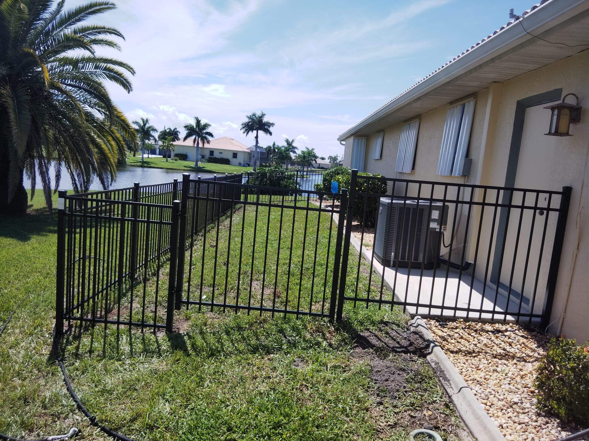 Black Aluminum Picket Fence Installation in Punta Gorda by True Fence LLC