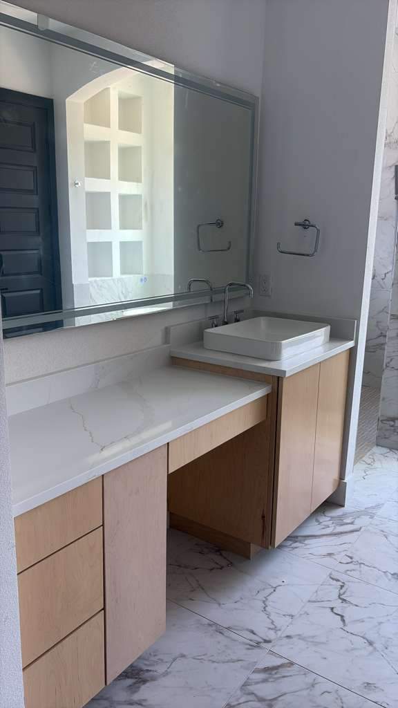 A home with a mix of quartz options by Mena stone surfaces
