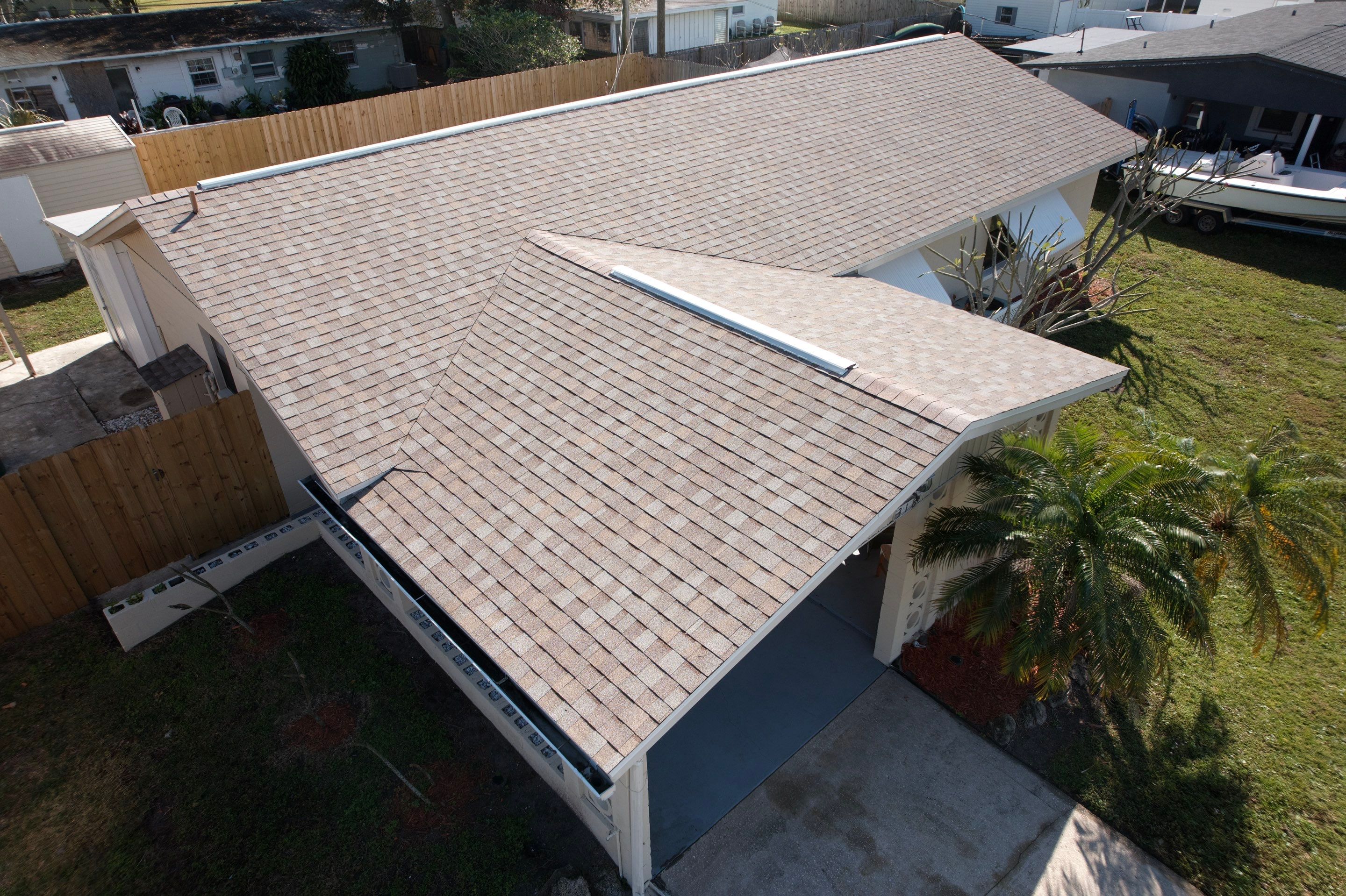Complete Asphalt Shingle and Flat Roof Replacement in Merritt Island by Wiedmann Construction & Roofing
