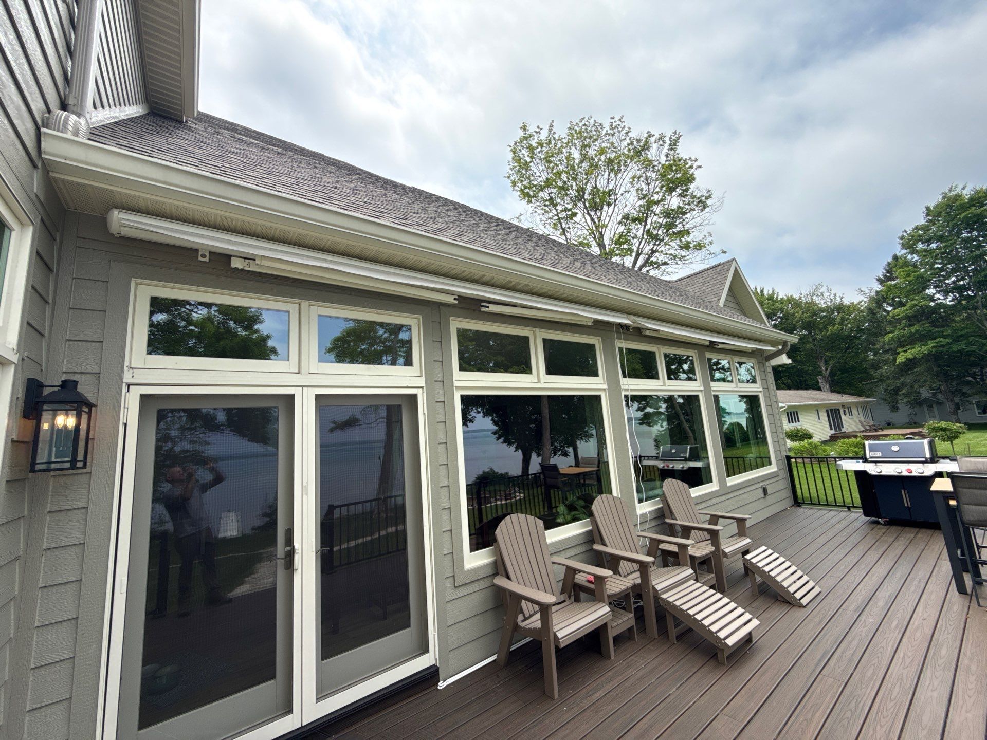Sunesta Retractable Awning Installation for Sault Sainte Marie Lakeside Deck by Rainbow Seamless Systems
