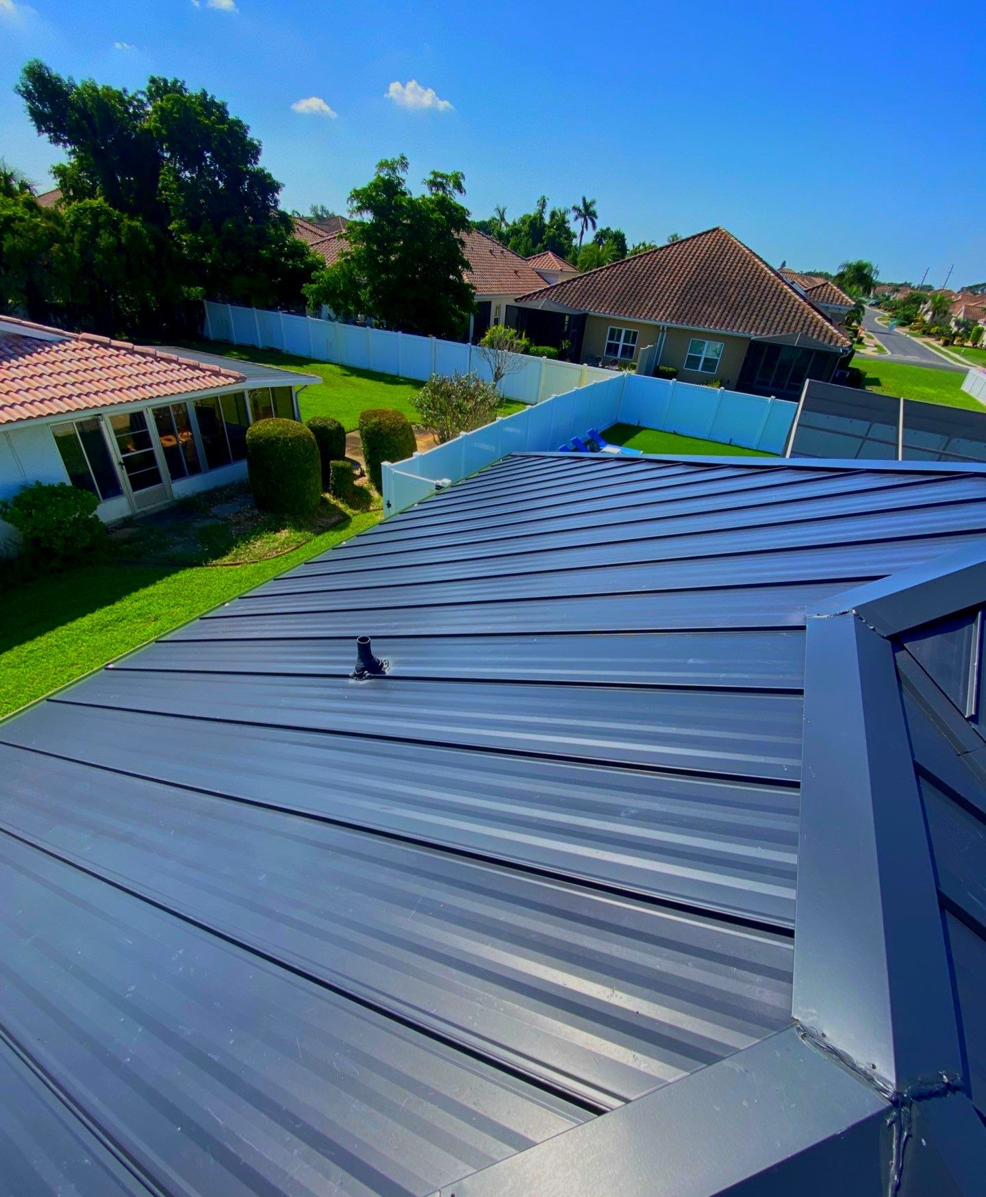 Metal Roofing System by Rooster Roofing, LLC
