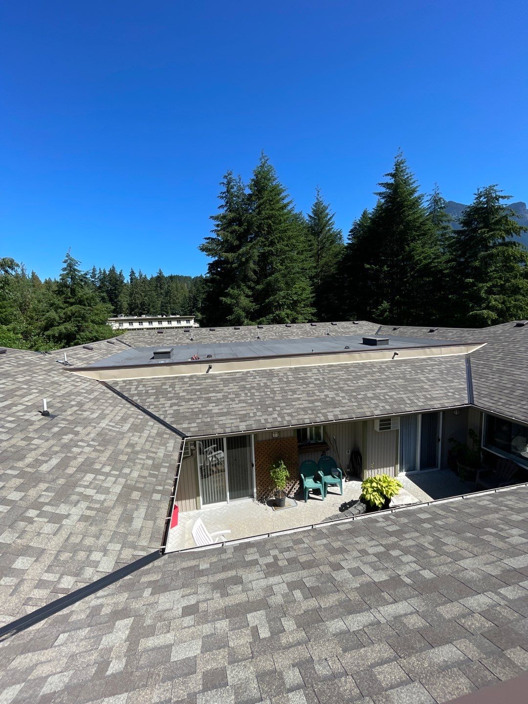 Residential ReRoofing Installation using OC Oakridge shingles by Top Notch Roofing Inc