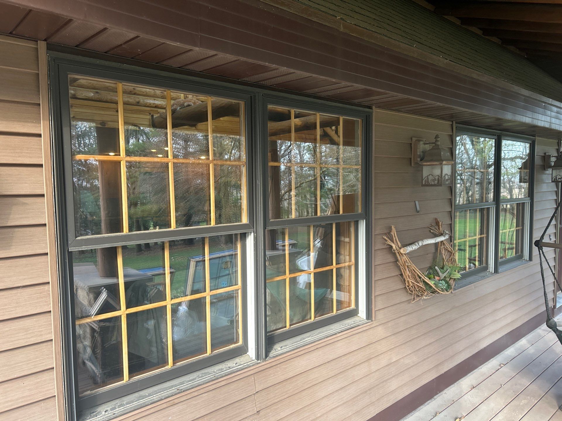 Pella Window installation using Pella Lifestyle wood/Aluminum window by United Windows and Siding LLC