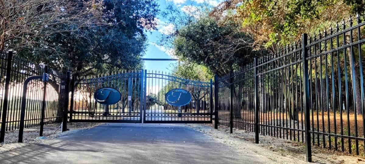 Custom Aluminum Gates with Automation by Superior Fence and Rail