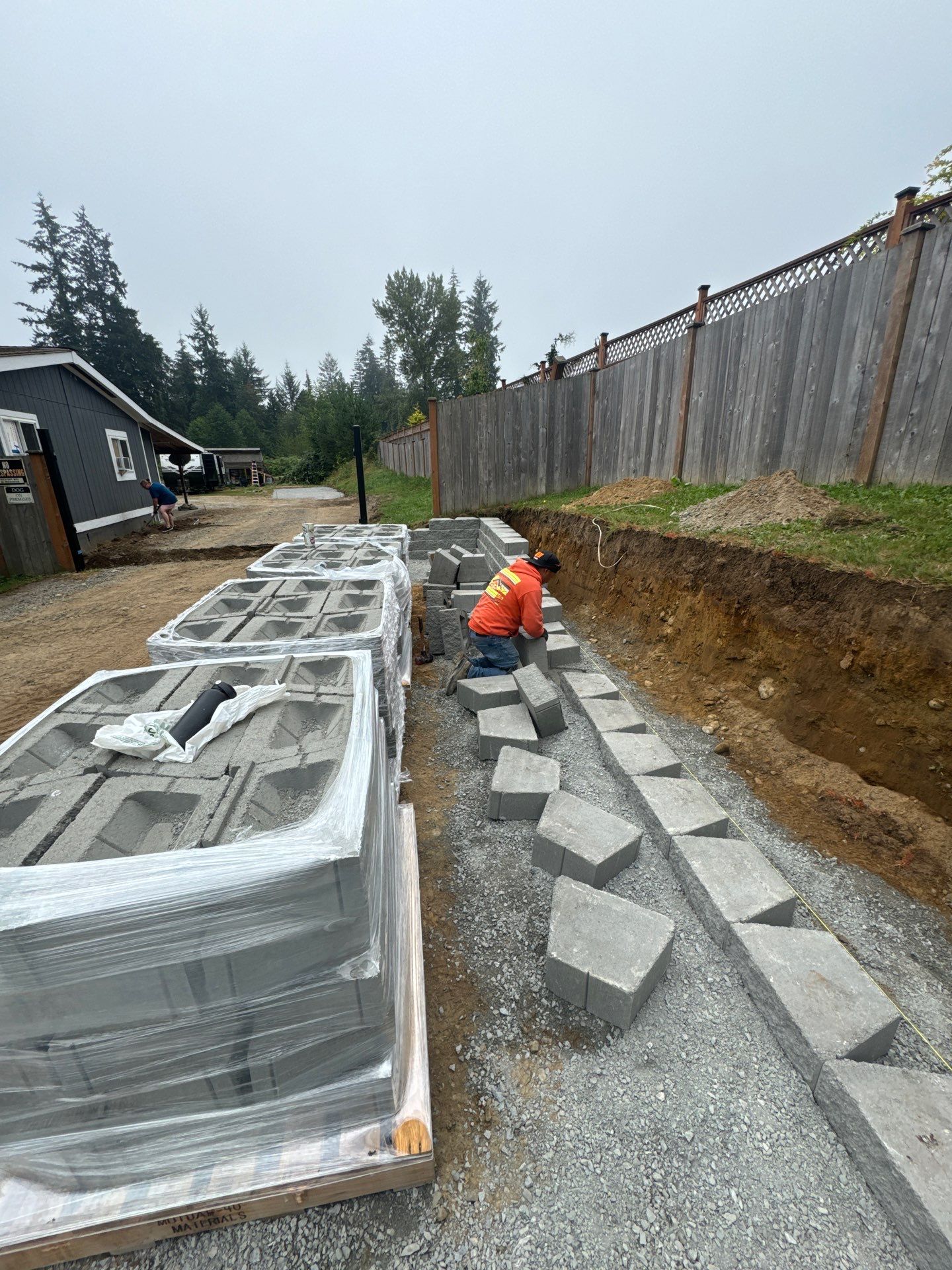 Joann | Asphalt Driveway & Retaining Wall  by Jireh Asphalt & Concrete Inc 