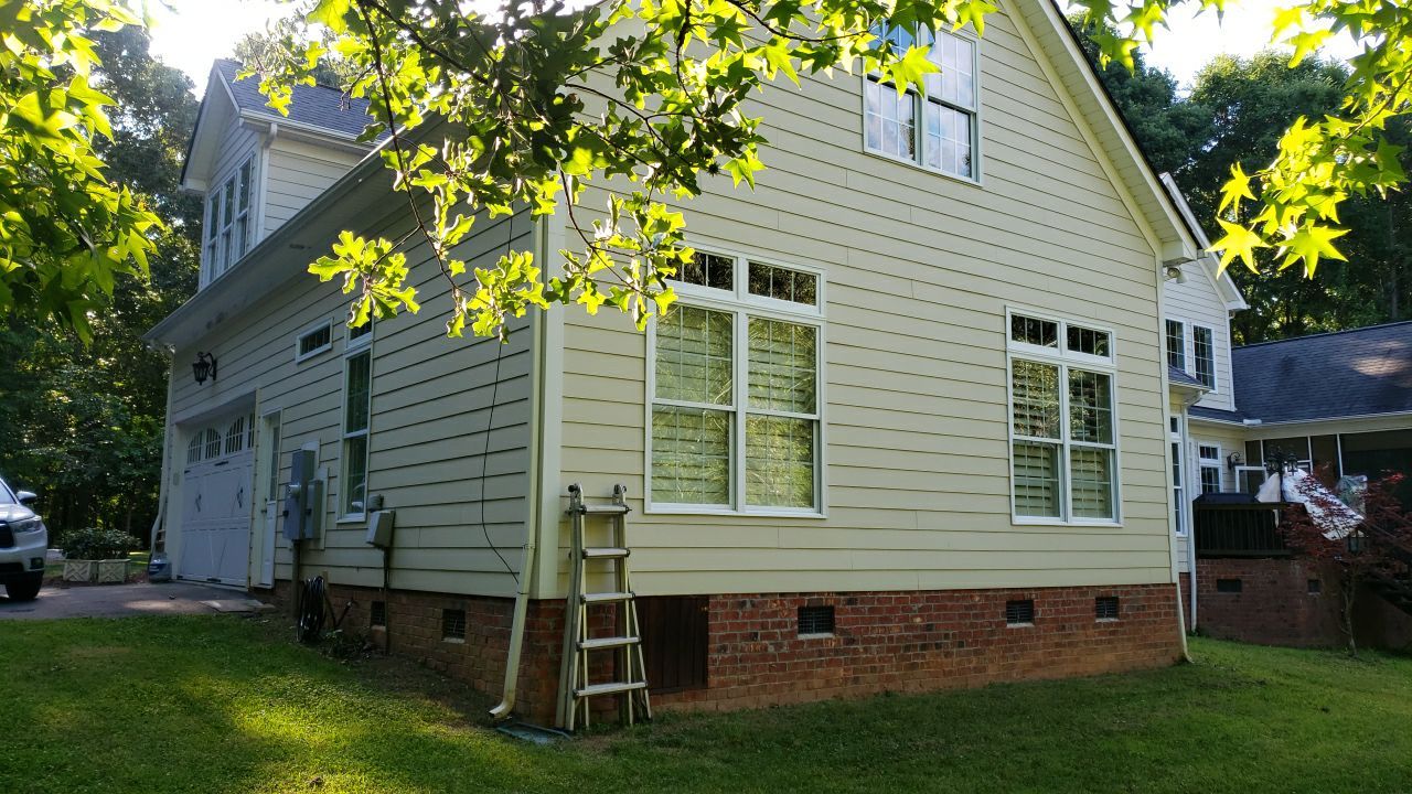 House Wash using cleaner by Power Wash Masters LLC
