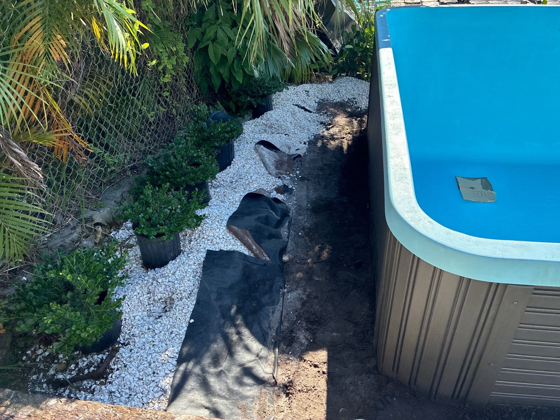 Grading back yard oasis by Level One Grading