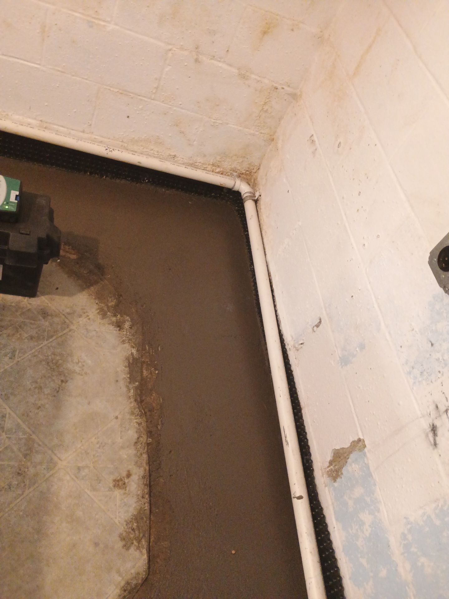 Drain Tile & a Sump Pump for our Property Management Partner by Waterproofing Northeast