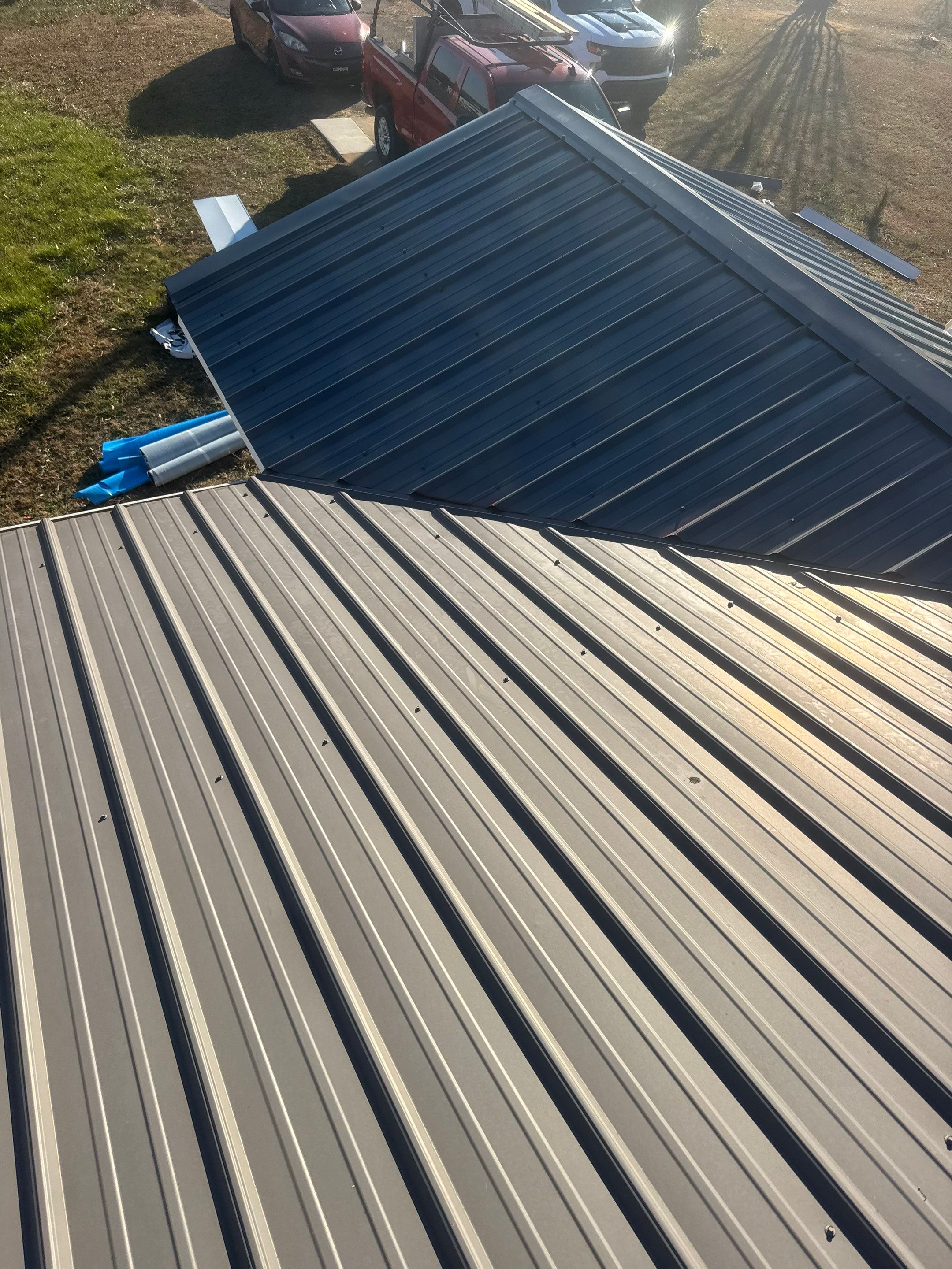 Residential Roofing Repair using Metal Charcoal Tuff Rib by Roofsters