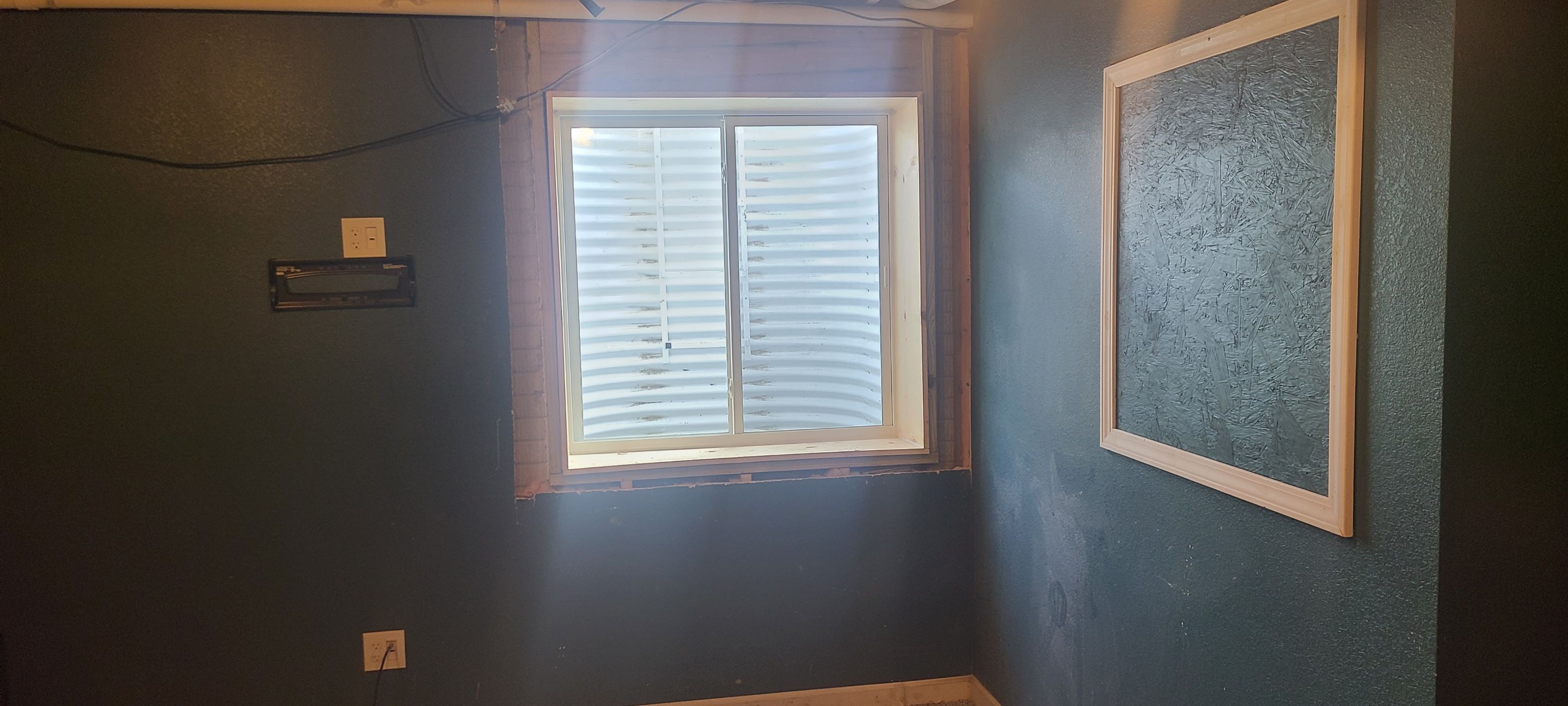 While Steel Egress Window Installation by Toledo Basement Repair