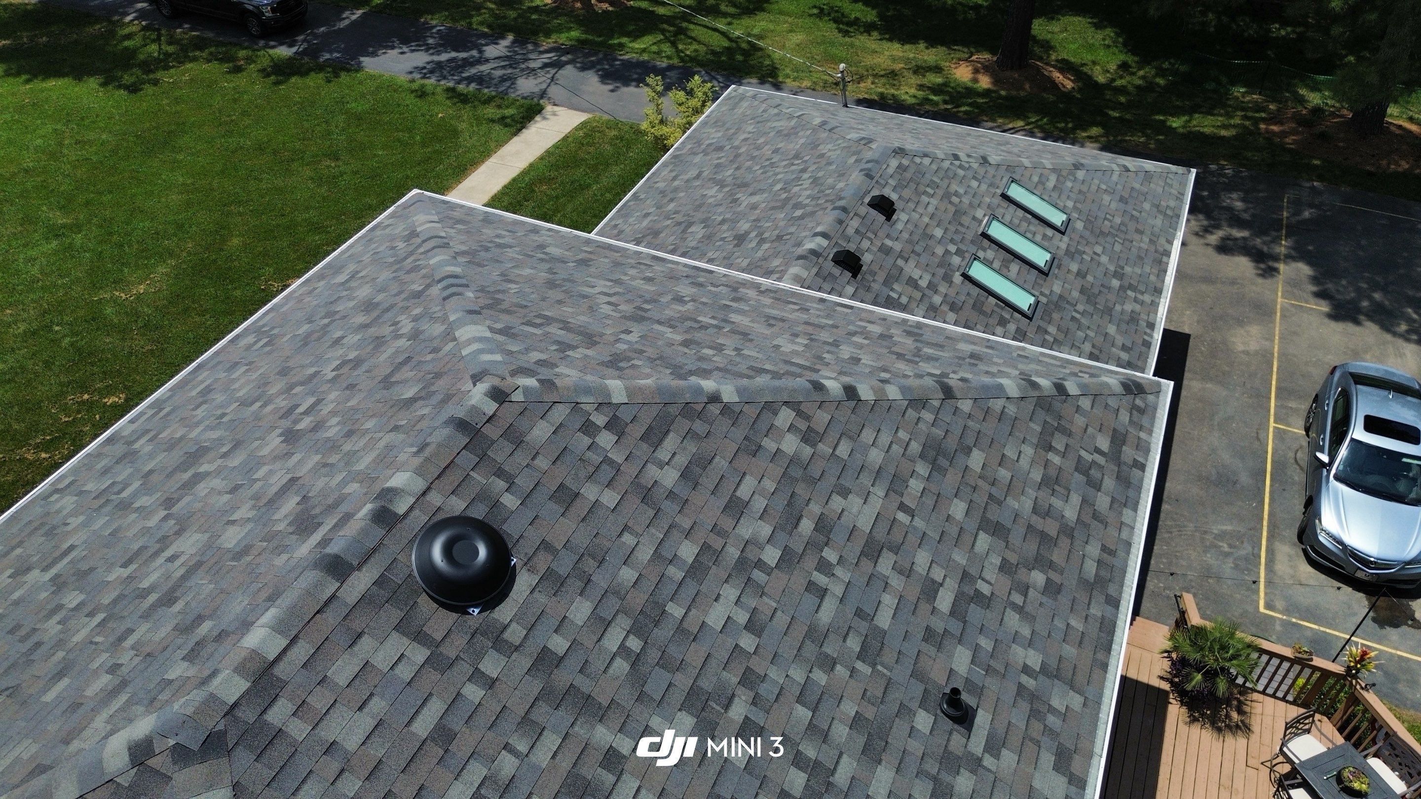 Full Roof Replacement and Skylight Installation for Franklin Colonial Home by Shinglesmiths Roofing