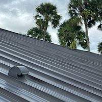 24ga 1.5" Mechanical Seam Dark Bronze by Total Roofing System The Metal Roof Experts