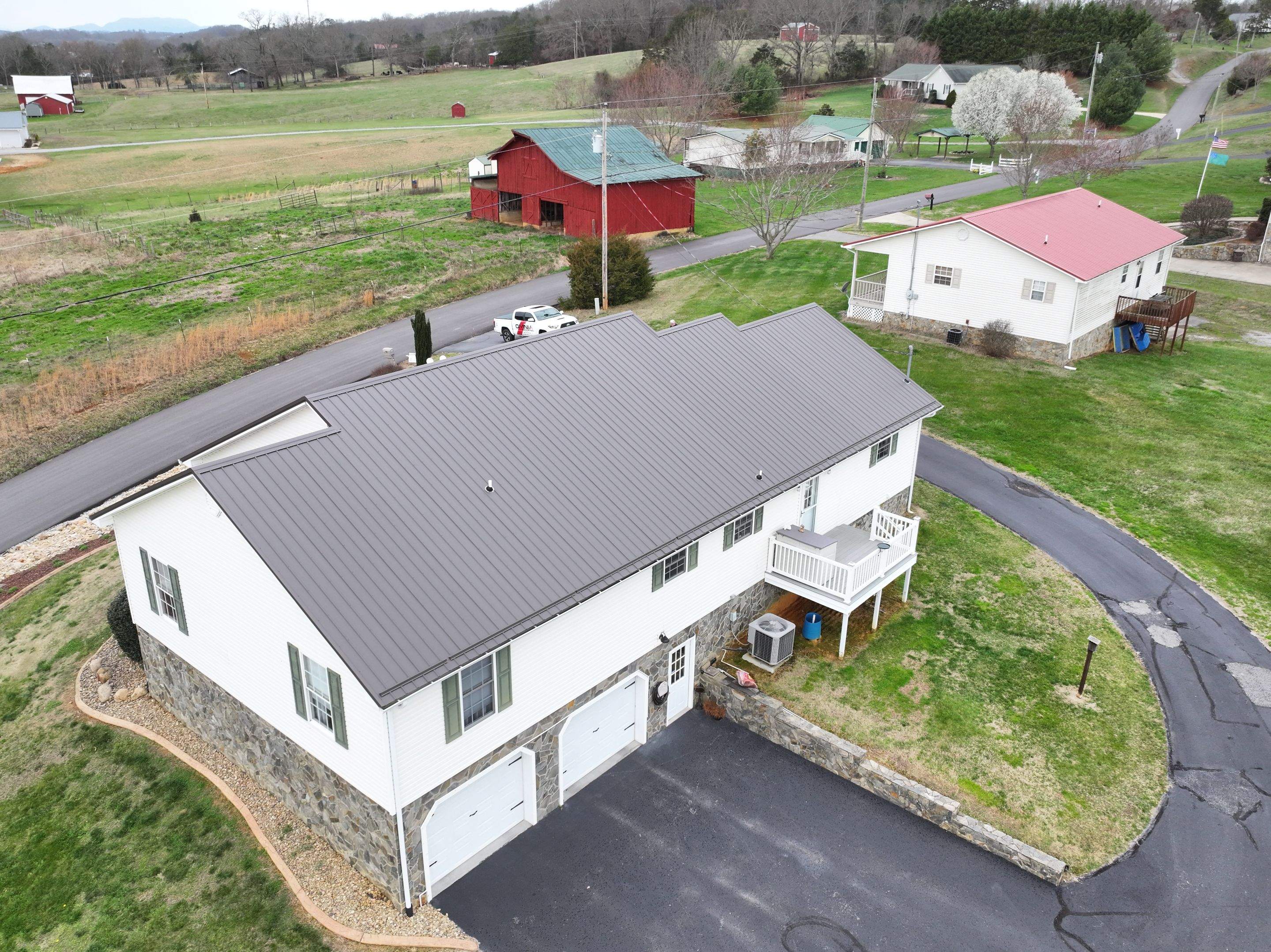 Lutackas Residence by Omnia Roofing