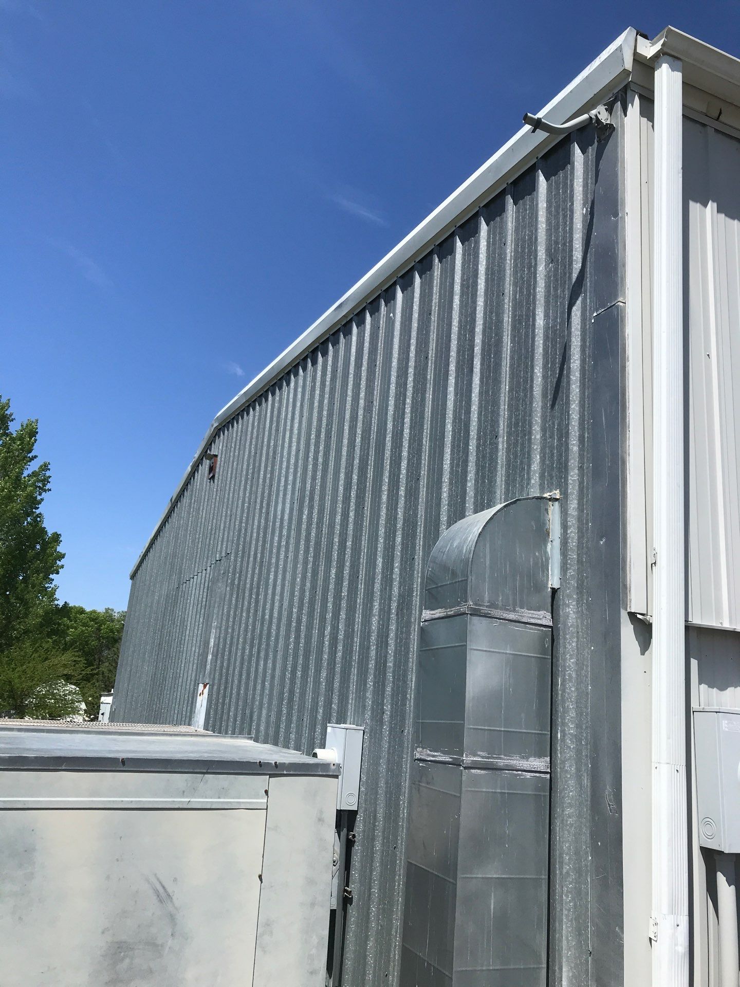 Commercial Shop Renovation and Concrete Parking Installation in Brookings by Select Painting, Coatings & Garage Cabinets