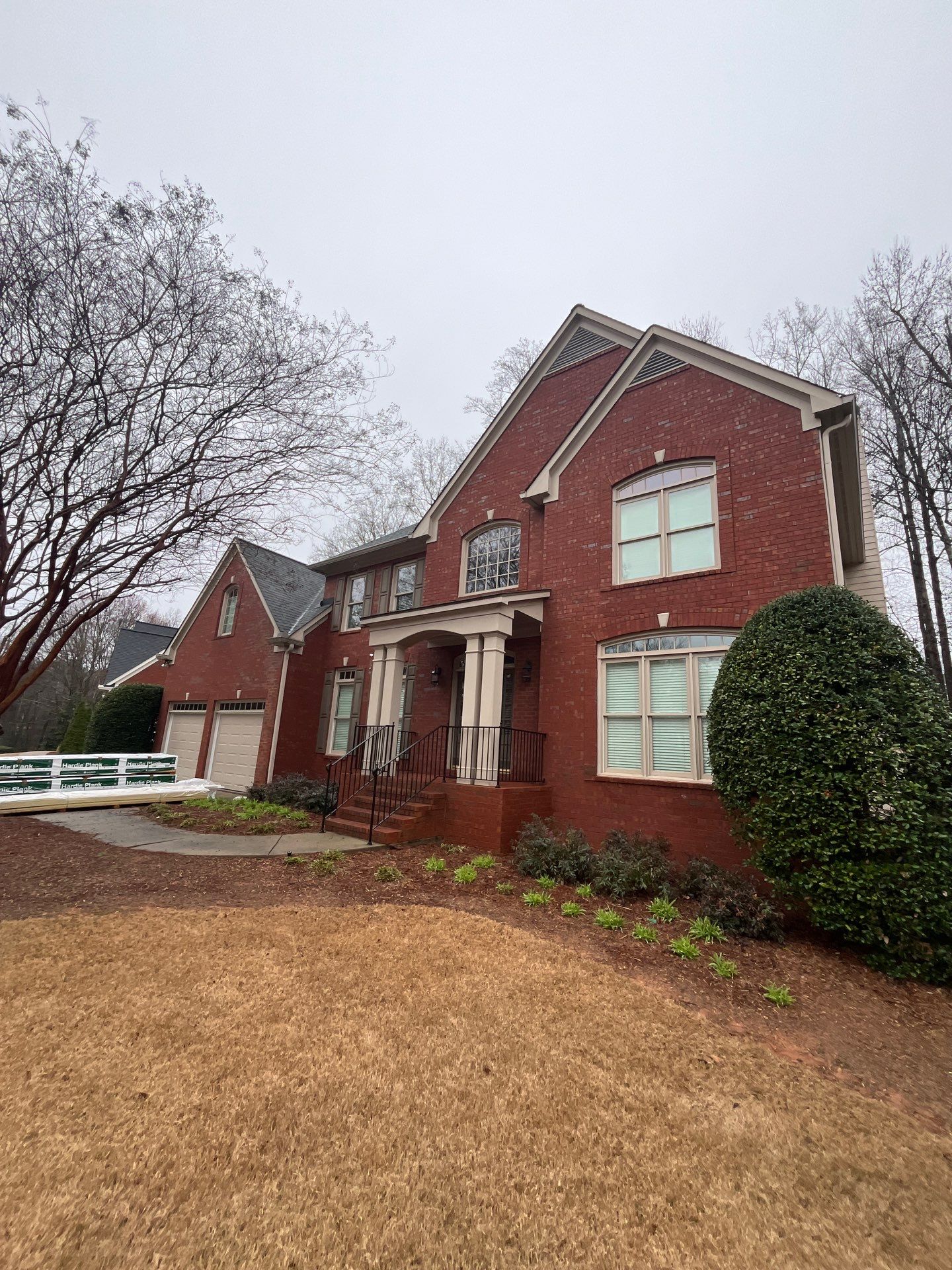 James Hardie Siding Replacement, Rotten Wood Replacement, Exterior Painting, and Front Porch Column Replacement by Nelson Exteriors 