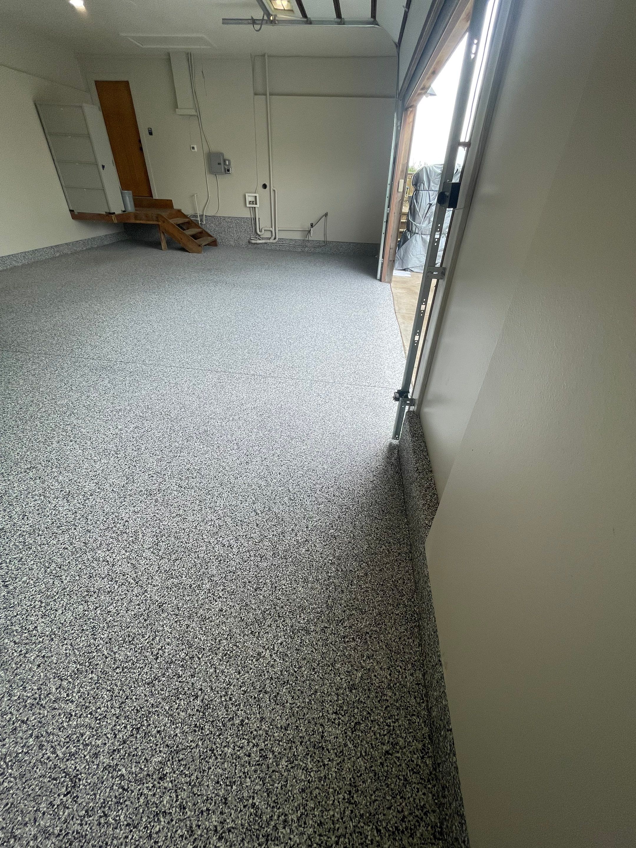 Domino Flake Floor Coating and Crack Repair in Chancellor by Select Painting, Coatings & Garage Cabinets