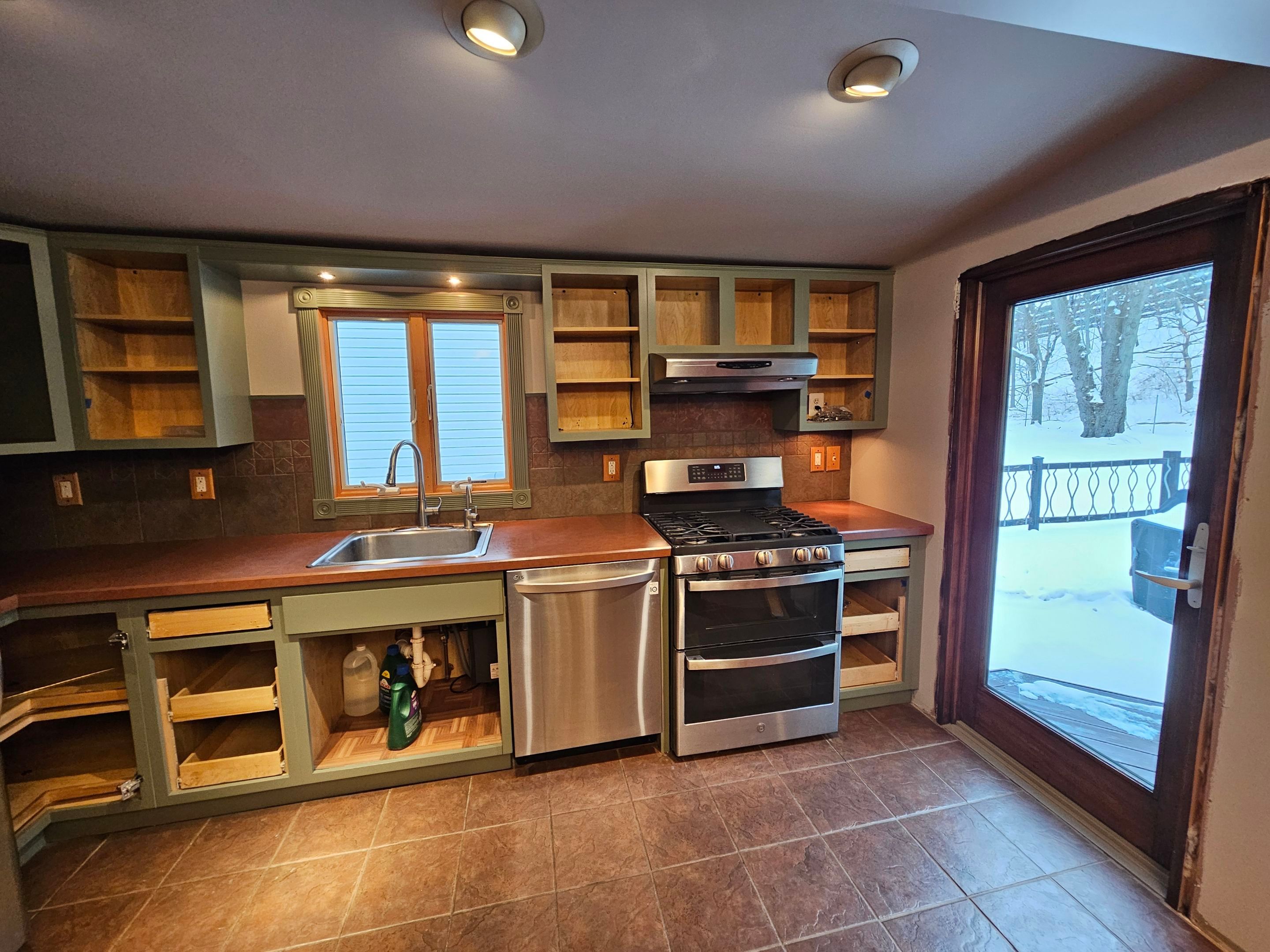 Cabinet Refinishing using Benjamin Moore Command Satin by Spectrum Painting, LLC