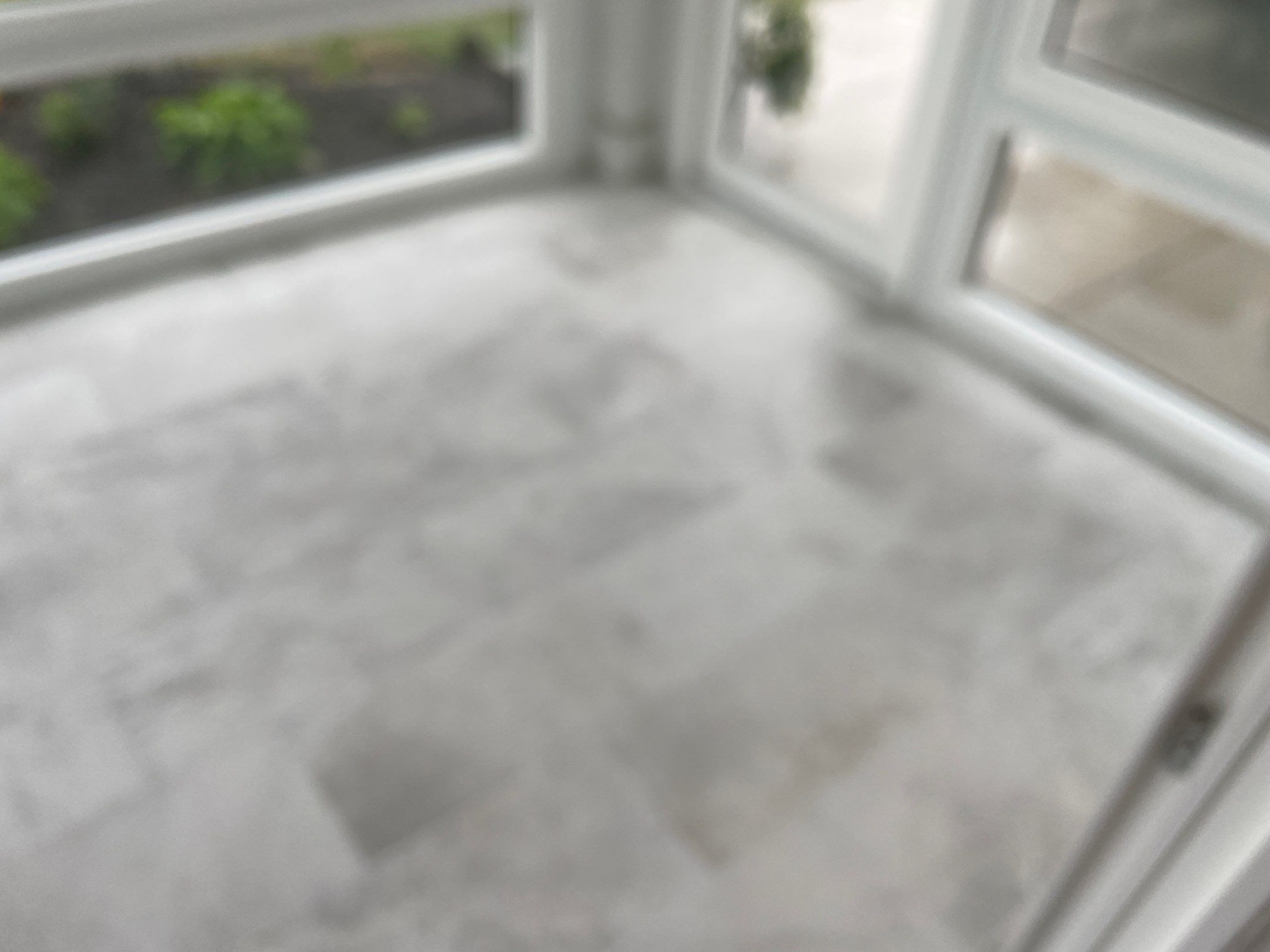 Amazing Tile Transformation After Enclosed Windows Added to Sunroom by Footprints Floors of Coastal Carolina