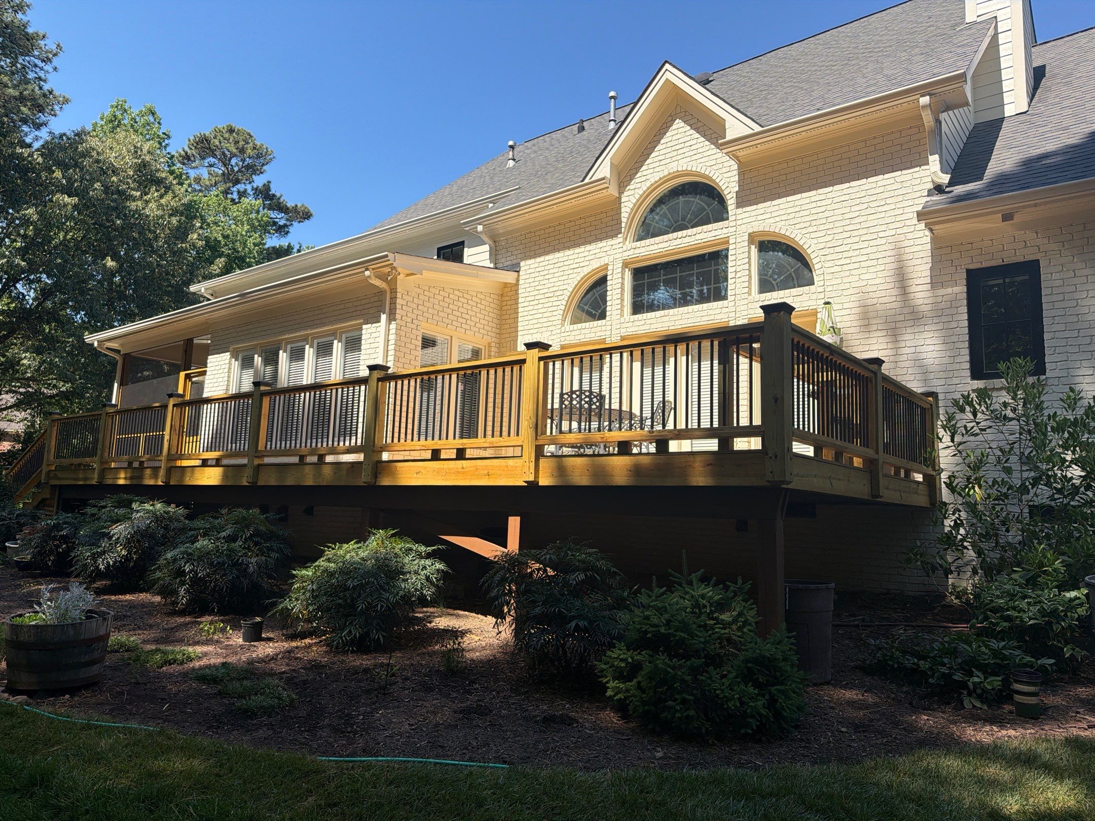 Deck Stain, Round Balusters & Screened Porch Transformation by Billy Weatherspoon Contractor
