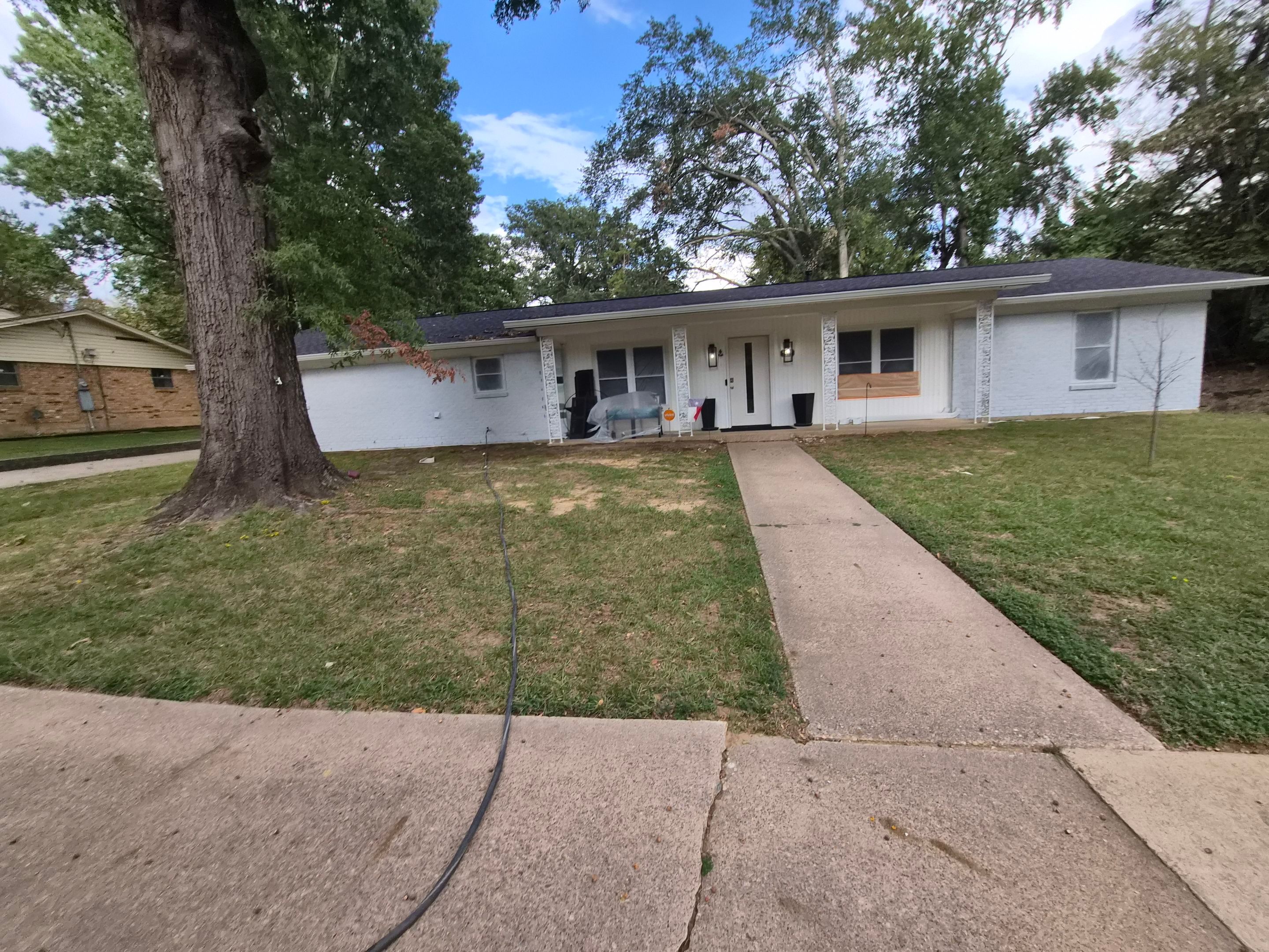 From Basic Brick to Bold Sage Green in Tyler, TX! Quality Coats Painting by Quality Coats Painting