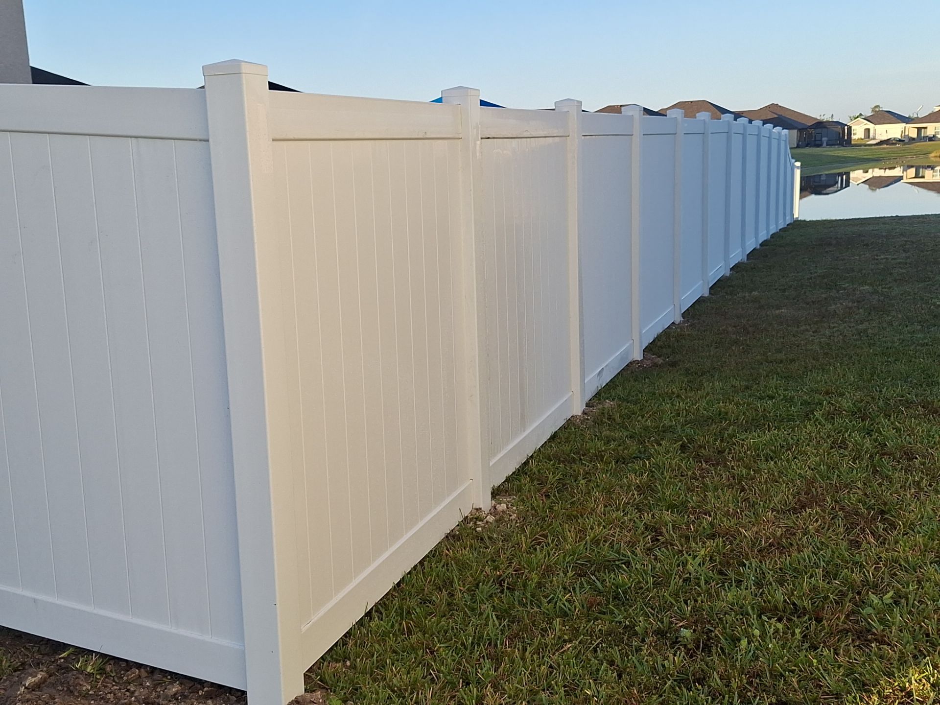 Vinyl Fence Installation using 6Ft White Vinyl Privacy Fence with a 4Ft White Clearwater Picket Fence by Asap fence and gates, LLC