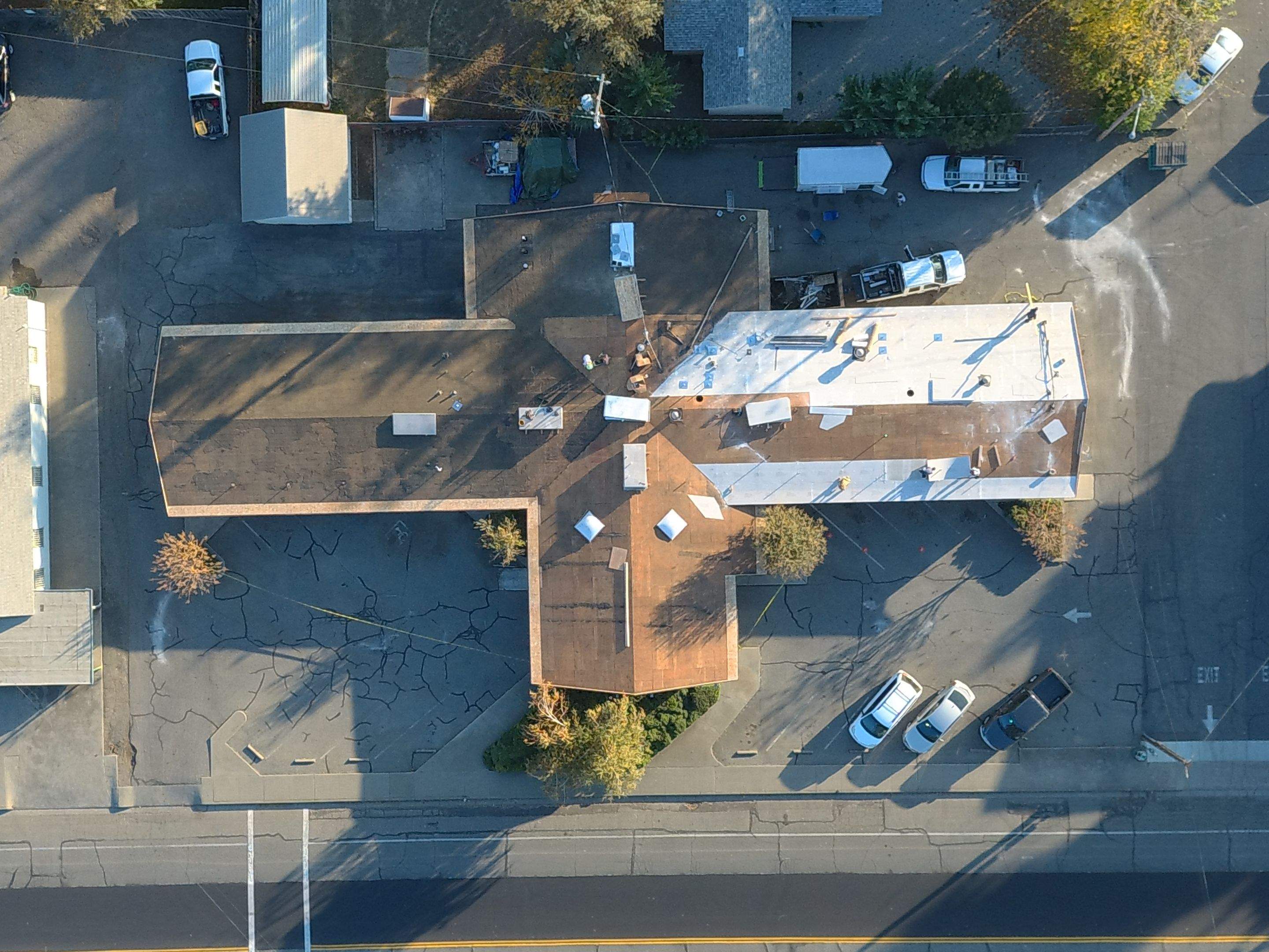 Spray foam and coatings using Conklin Benchmark/PUMA XL coatings and spray foam by Straight Edge Roofing Inc