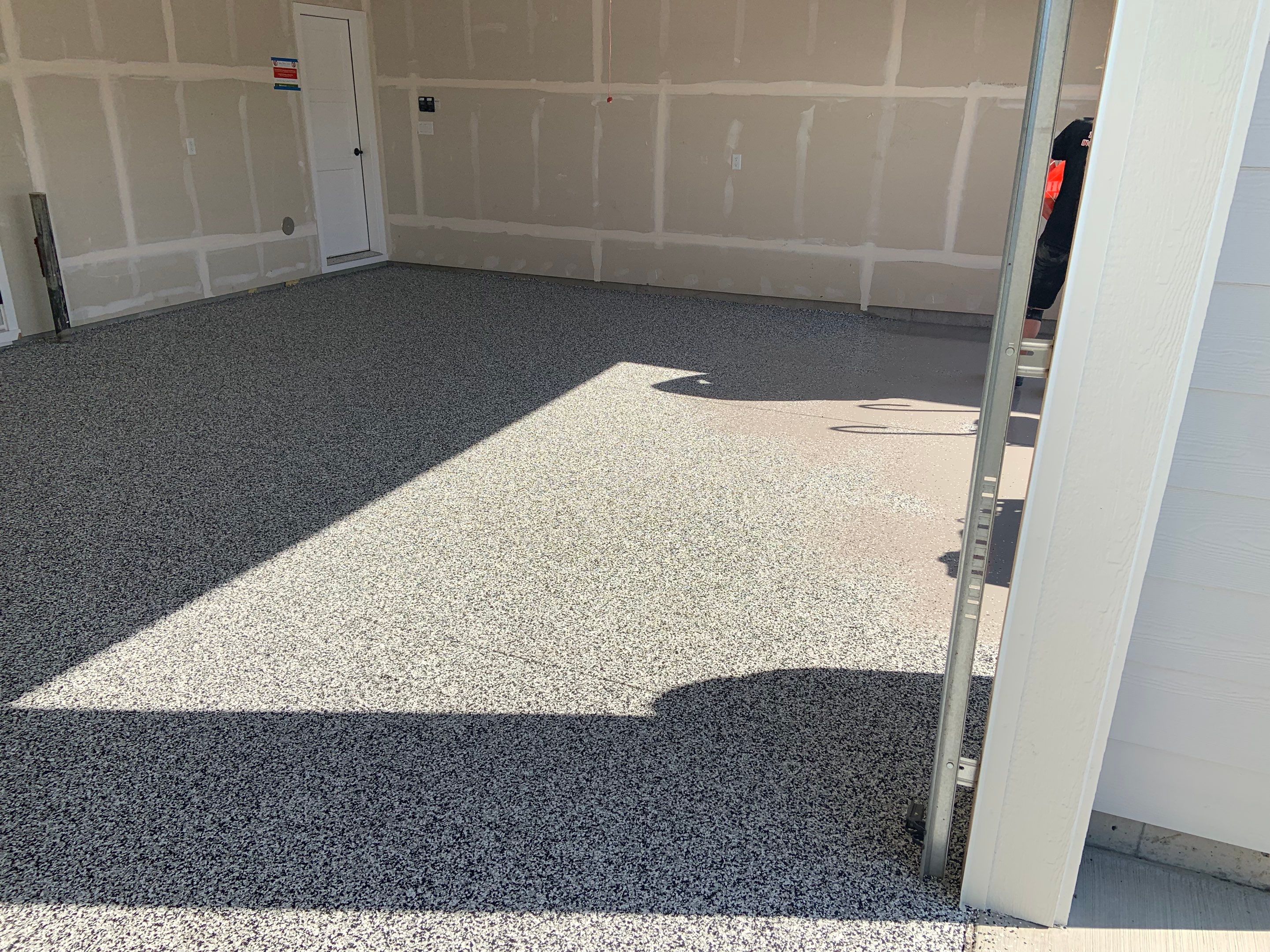 Garage Transformation using Domino by Croc Coatings, LLC