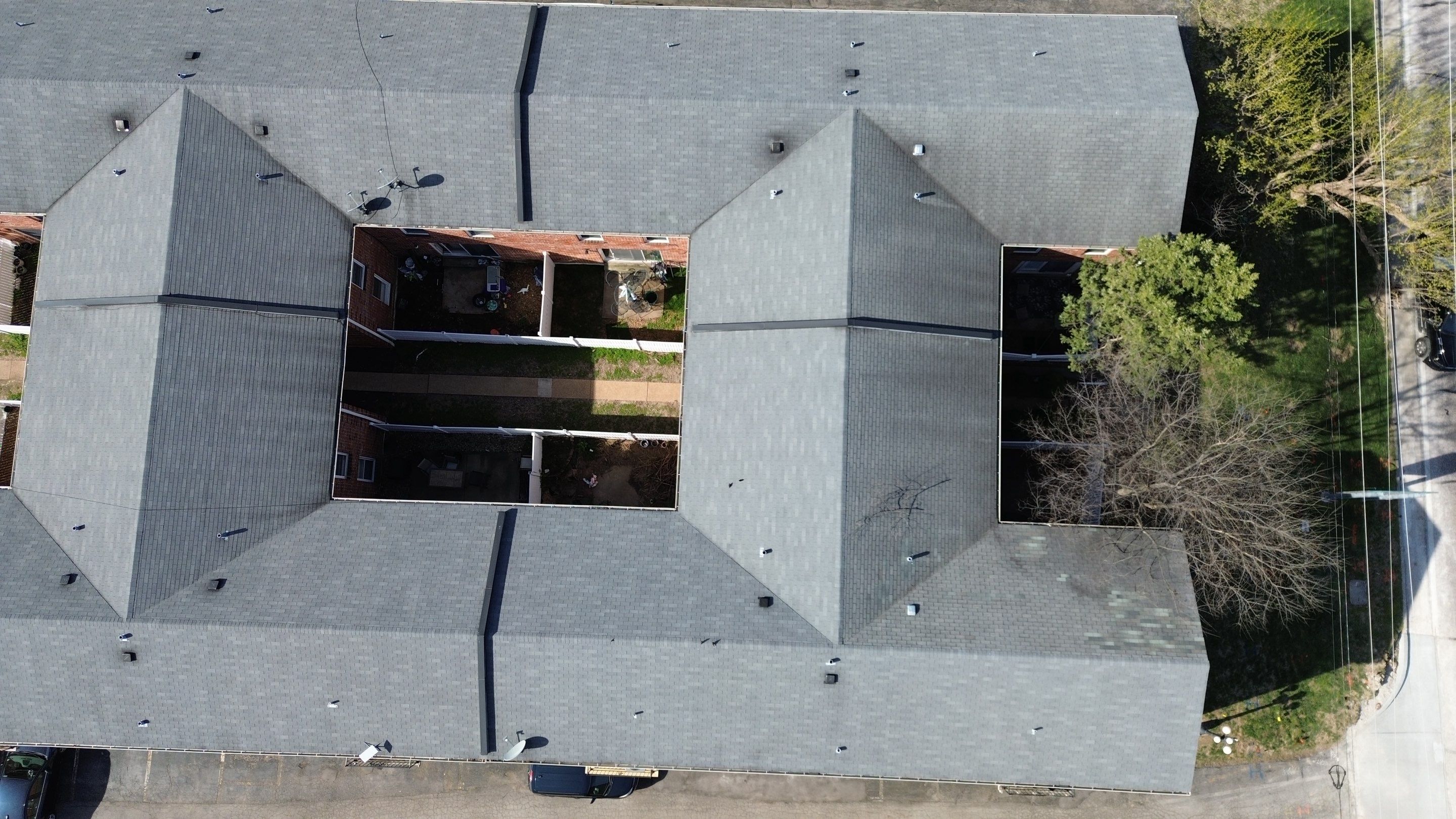Multi-Unit Roof Replacement and Decking Repair in St. Louis by Acute Roofing And Exteriors 