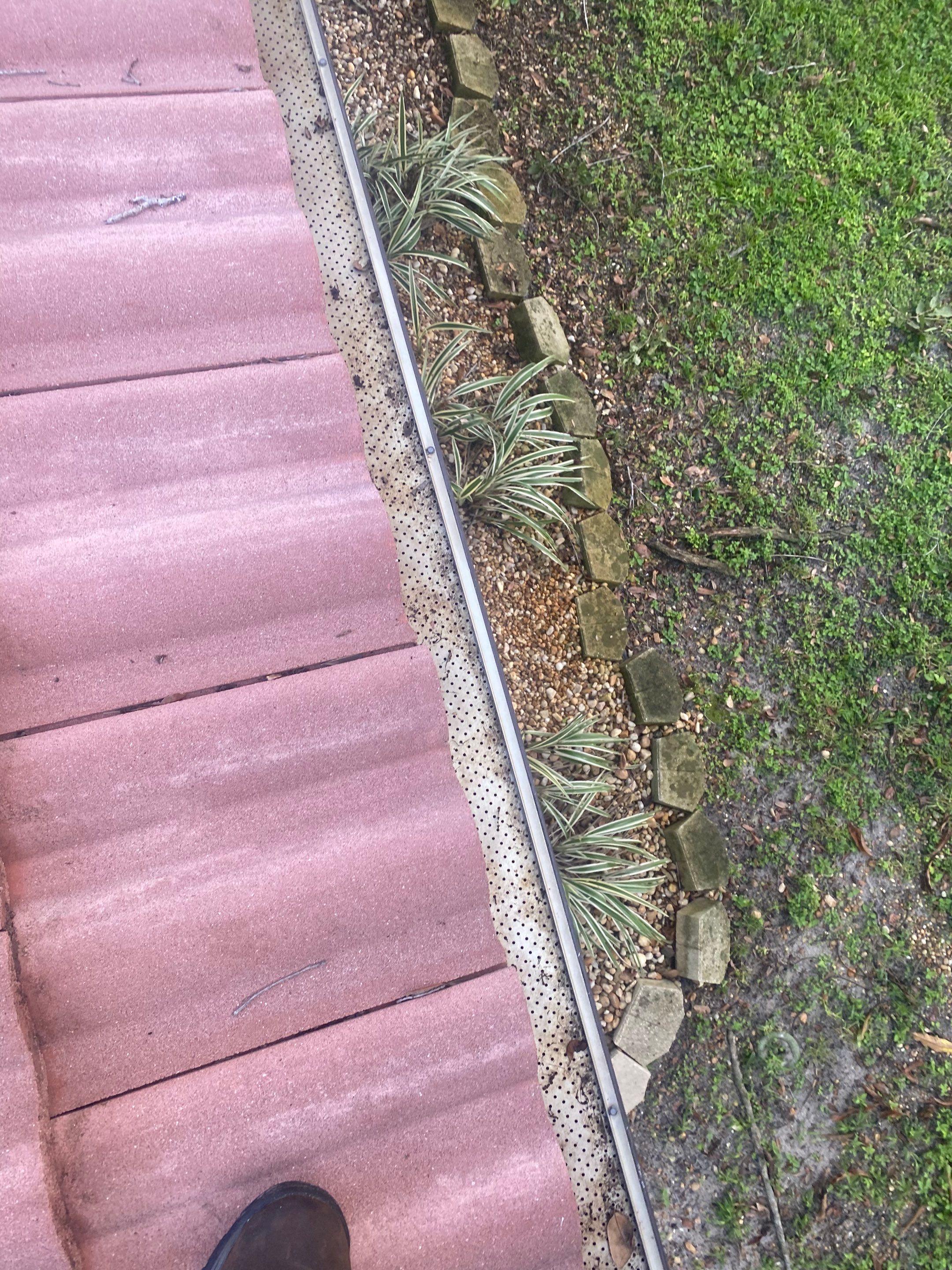 Gutter Guards Installation using gutter cleaning in Sarasota FL by Gutter Professors