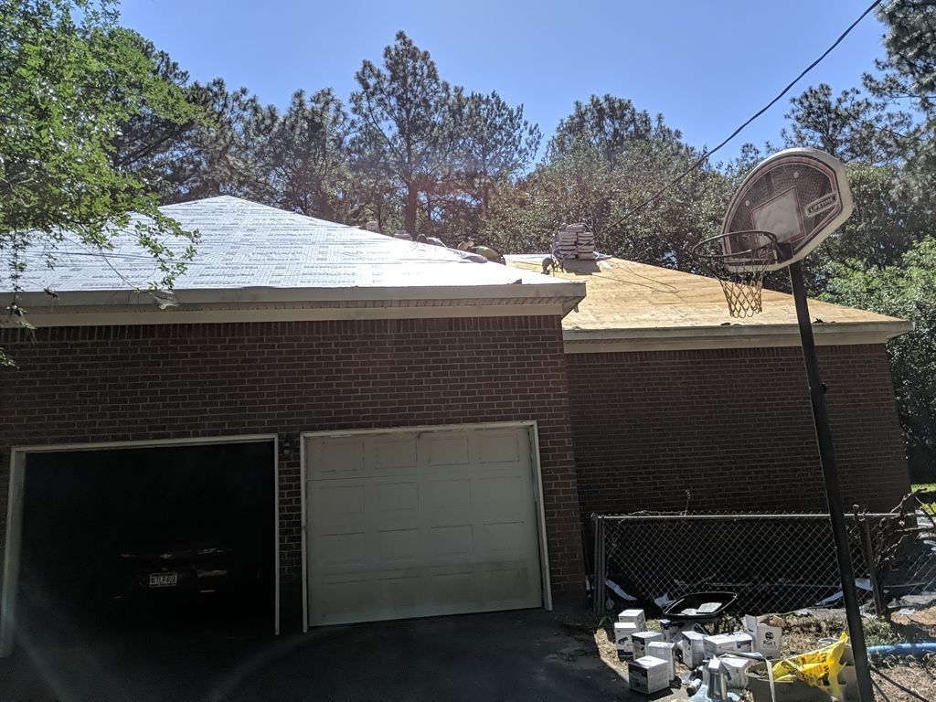Residential Roofing Installation using Roof Replacement by American Roofing & Construction LLC