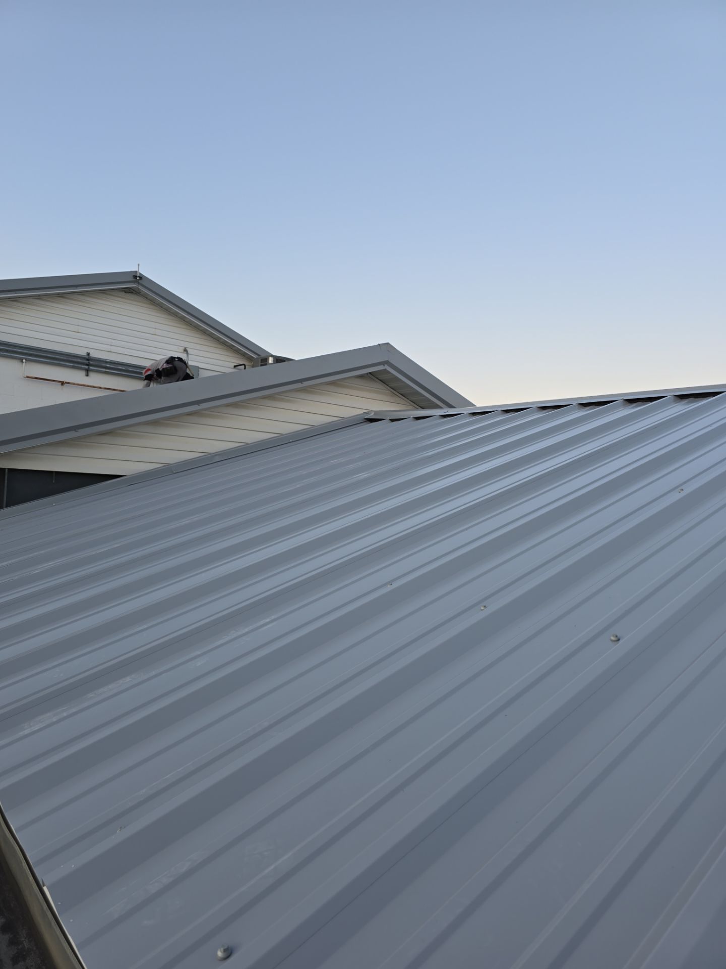Commercial Roofing Installation using Metal by Rainstoppers Roofing