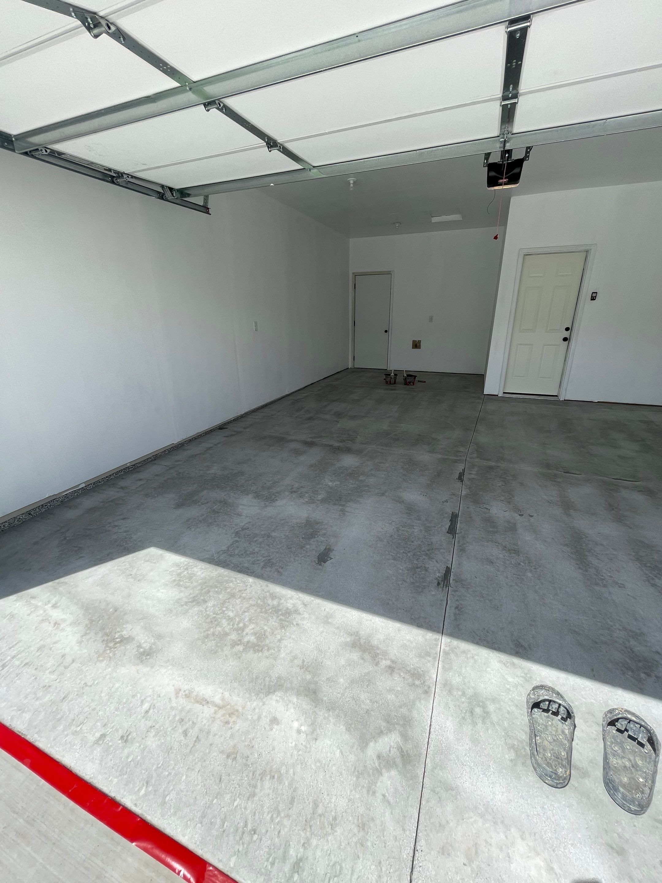 Sioux Falls Garage Floor Transformation with Cabin Fever Decorative Chips by Select Painting, Coatings & Garage Cabinets