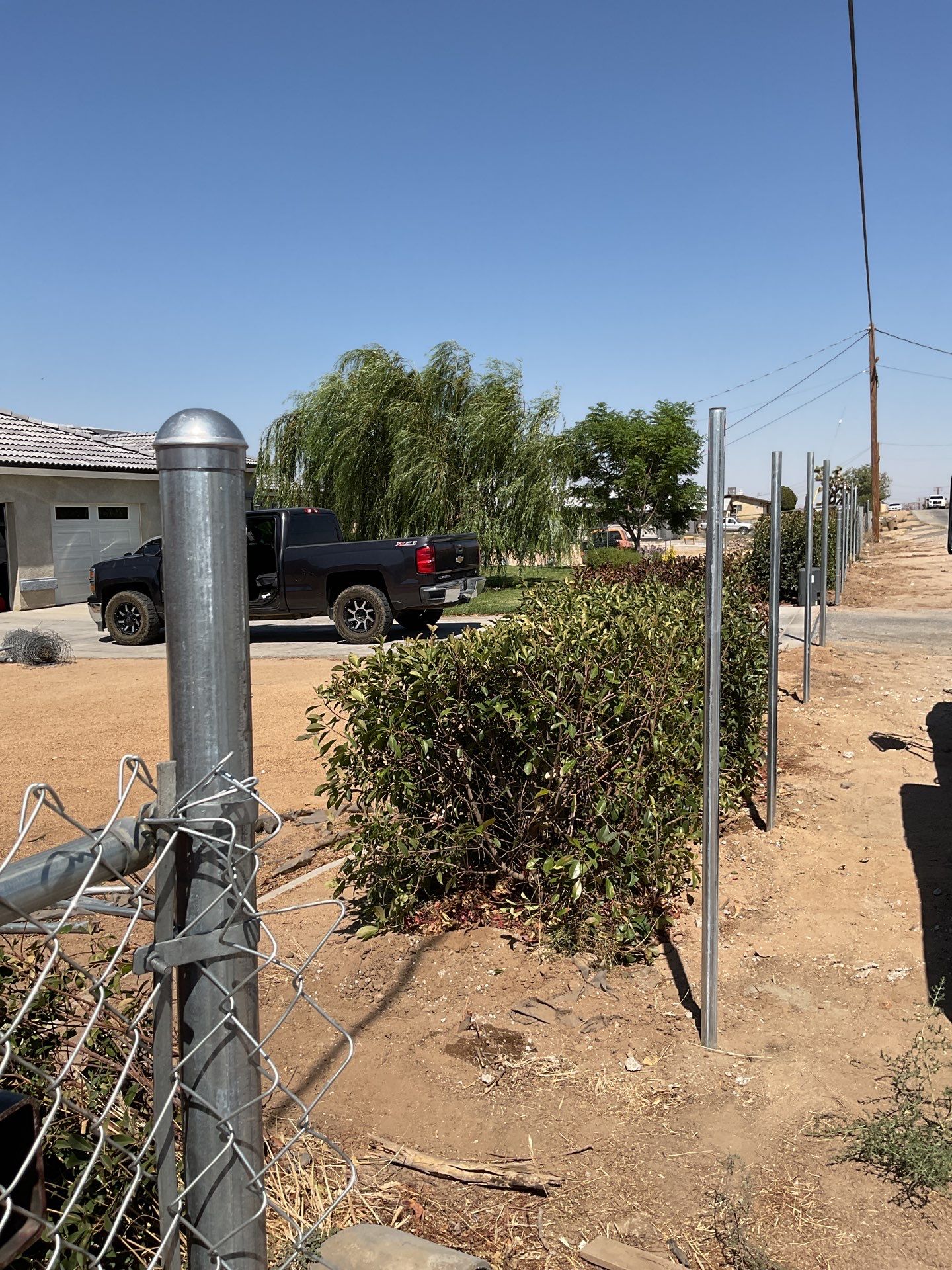 Fence Installation using chain -link by Fence Guys Inc.