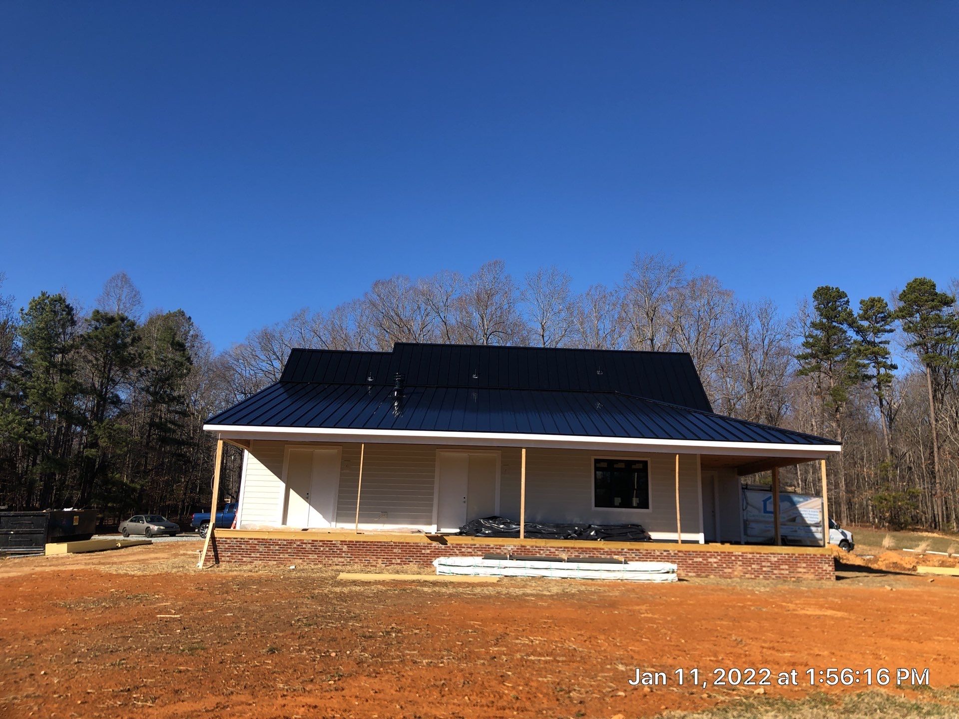 Custom Home Metal Roof Installation by Just In Time Roofing and Restoration