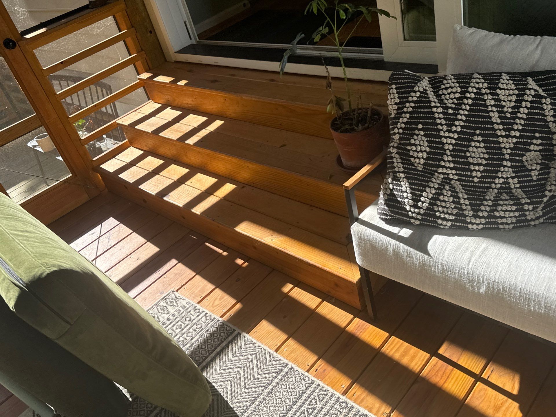 Porch staining by GonzalezPainters & Contractors Inc 