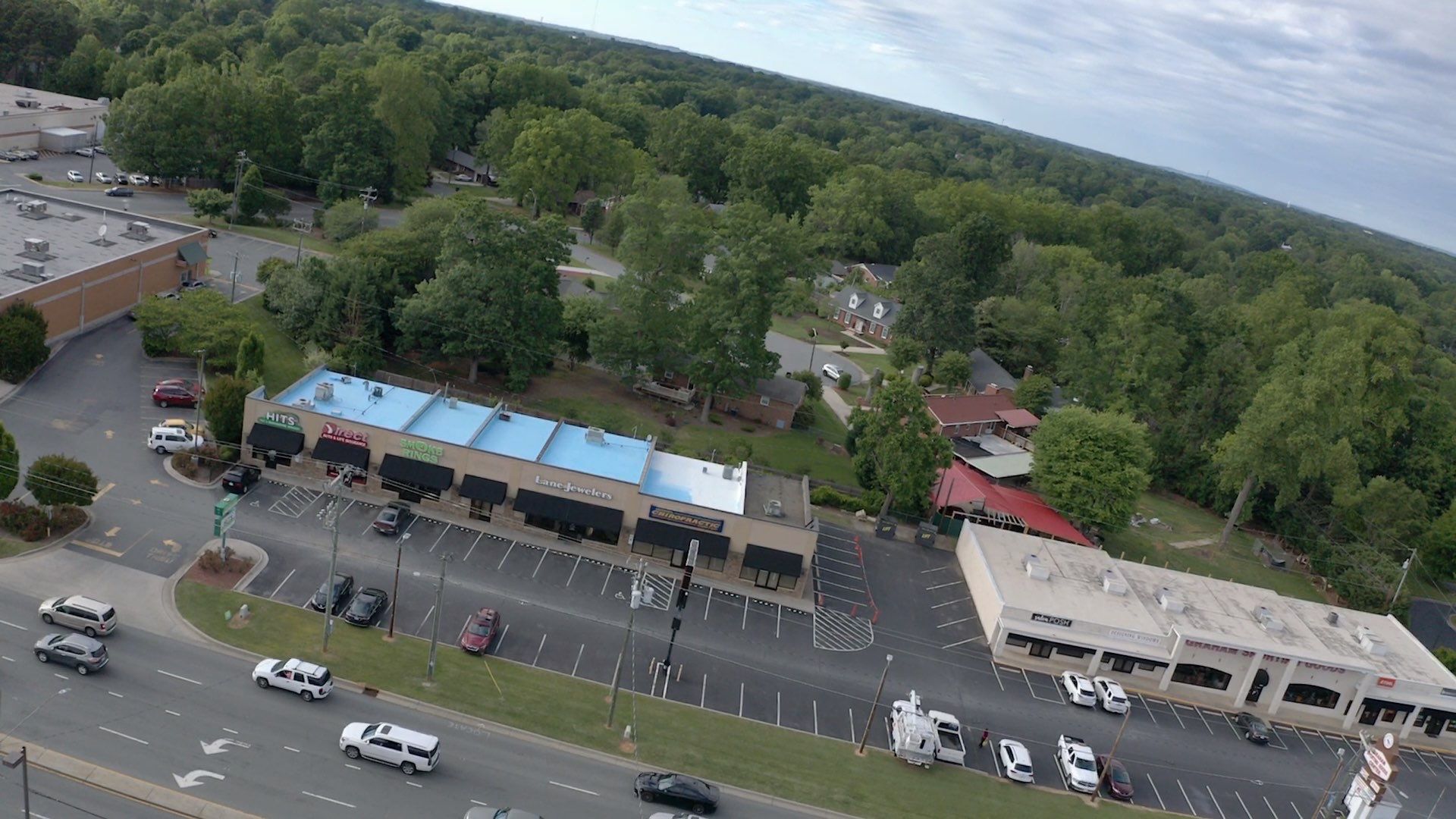 Commercial Roof Coating using Fiberseal basecoat and Silicon Topcoat by Just In Time Roofing and Restoration