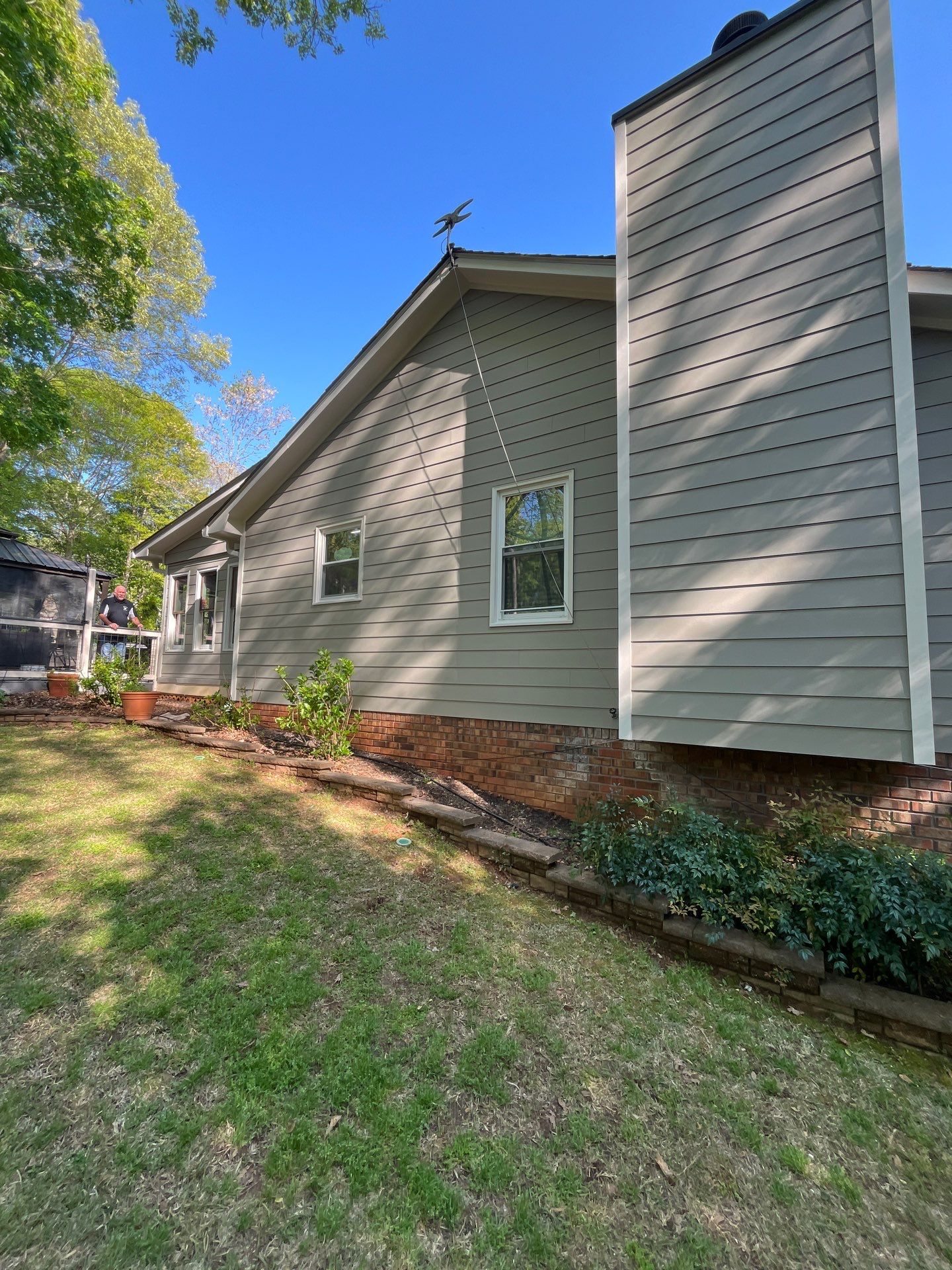 Window, Siding, & Rotten Wood Replacement with Exterior Painting in Woodstock, GA by Nelson Exteriors 