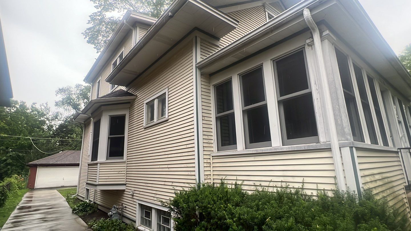 Housewashing  using Algaecide, soft wash soap by Northern Power Washing LLC.