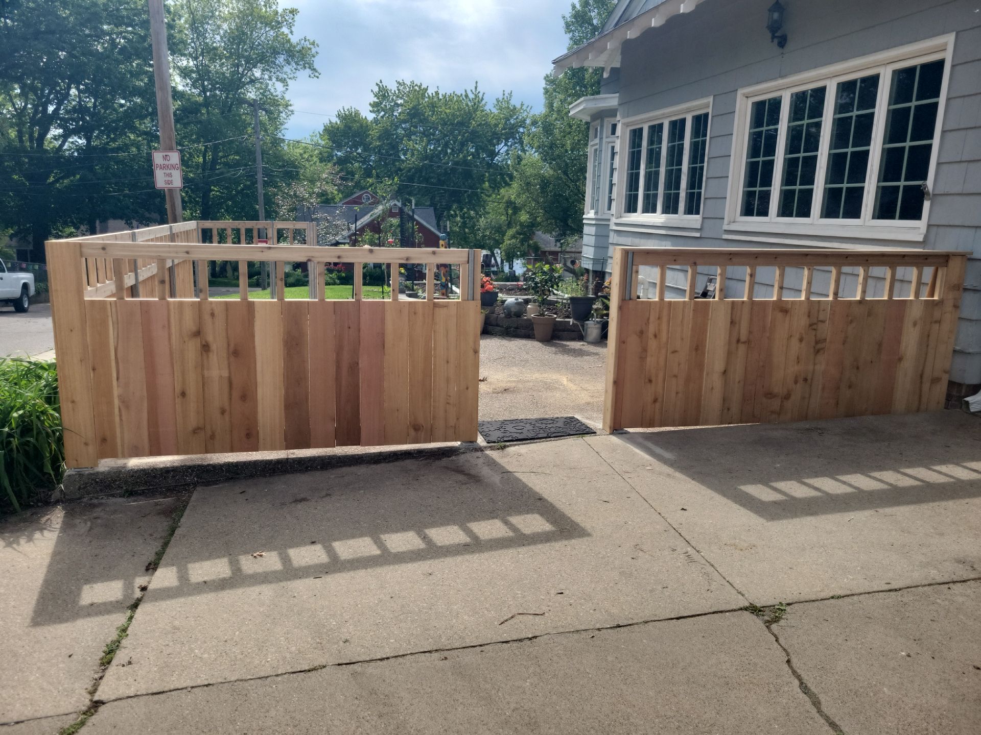 Custom Cedar Patio Fence in Waterloo by Perfect Picket Fence and Stain