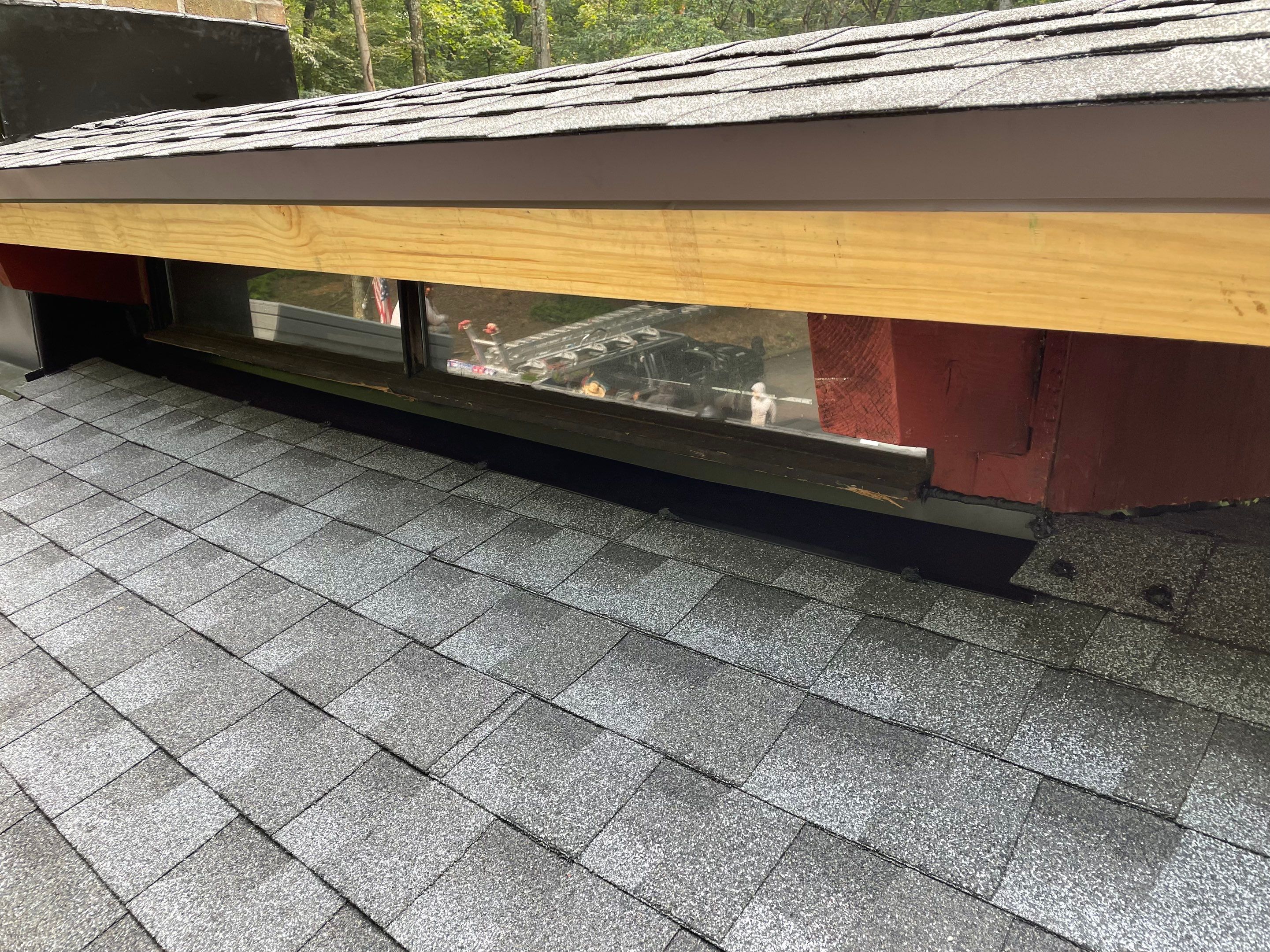 Deckhouse Roof Replacement by American Home Contractors