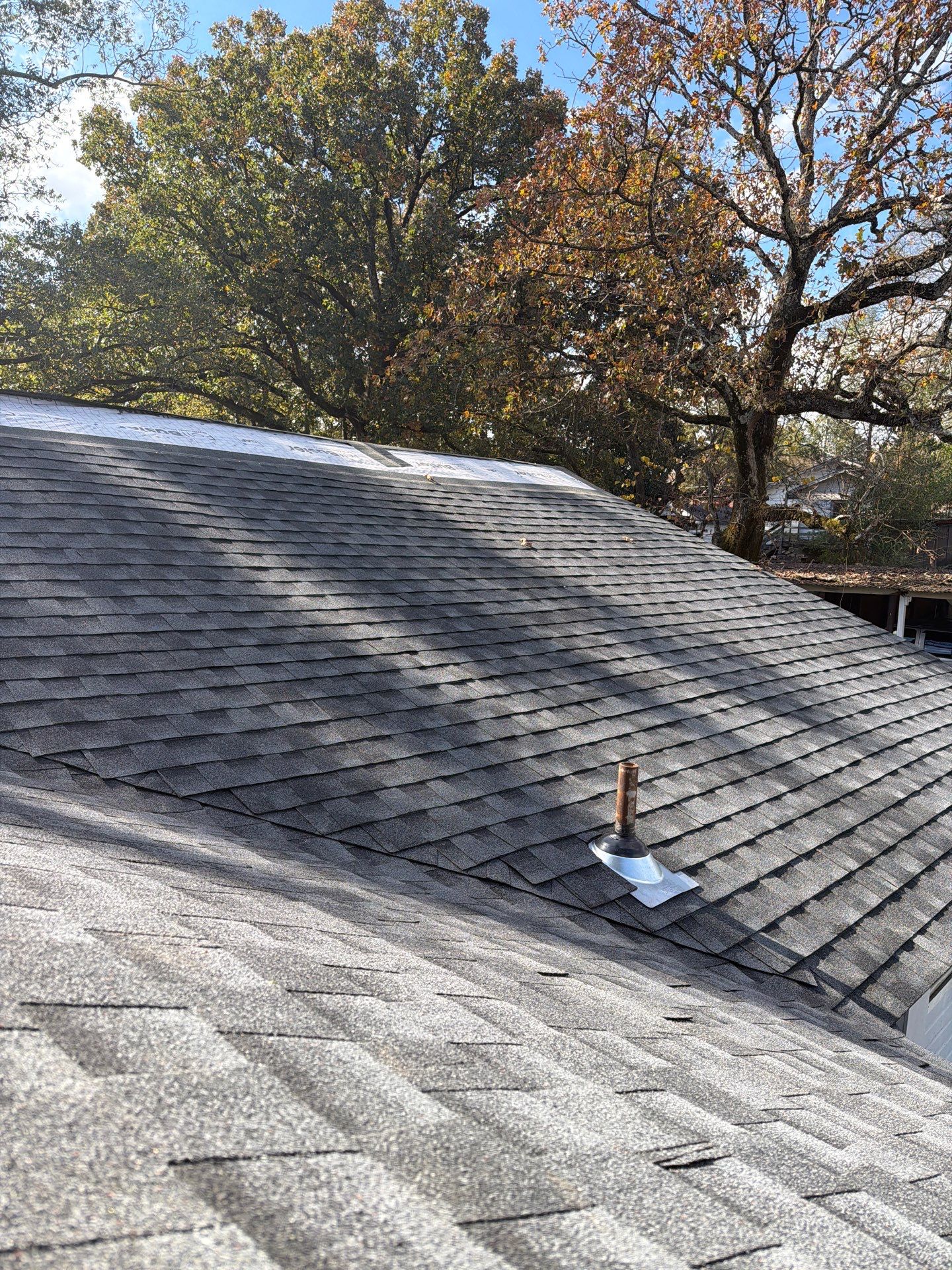 Roof Replacement in Midfield (Charcoal Shingles) by The Roofing Dudes